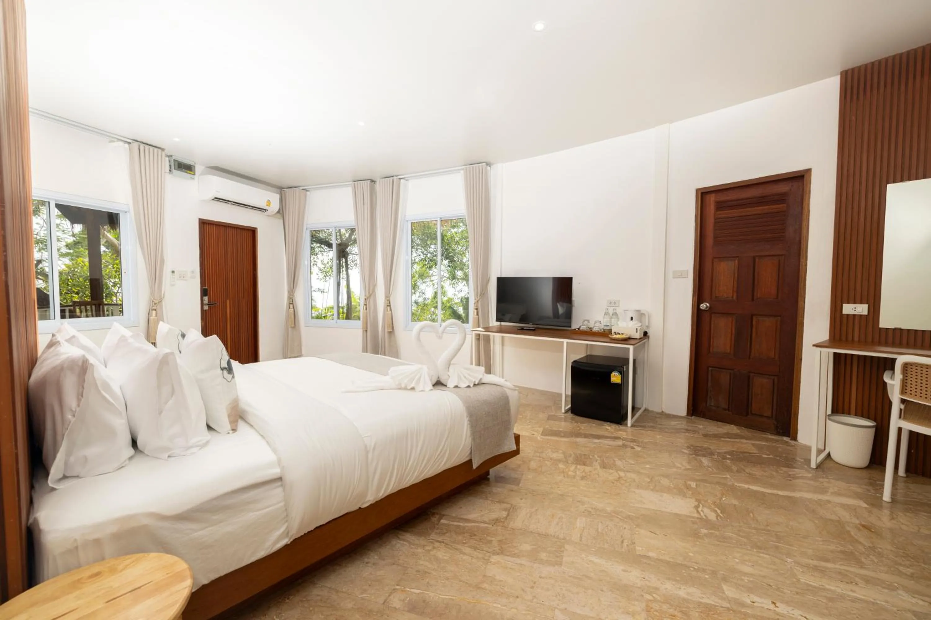 Bed in The AVA Resort Koh Tao