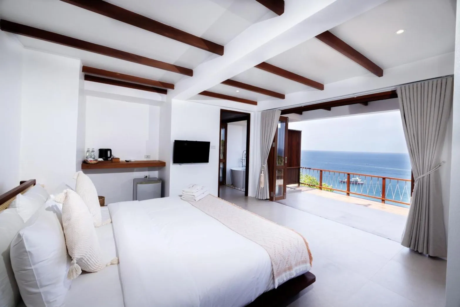 Bed in The AVA Resort Koh Tao