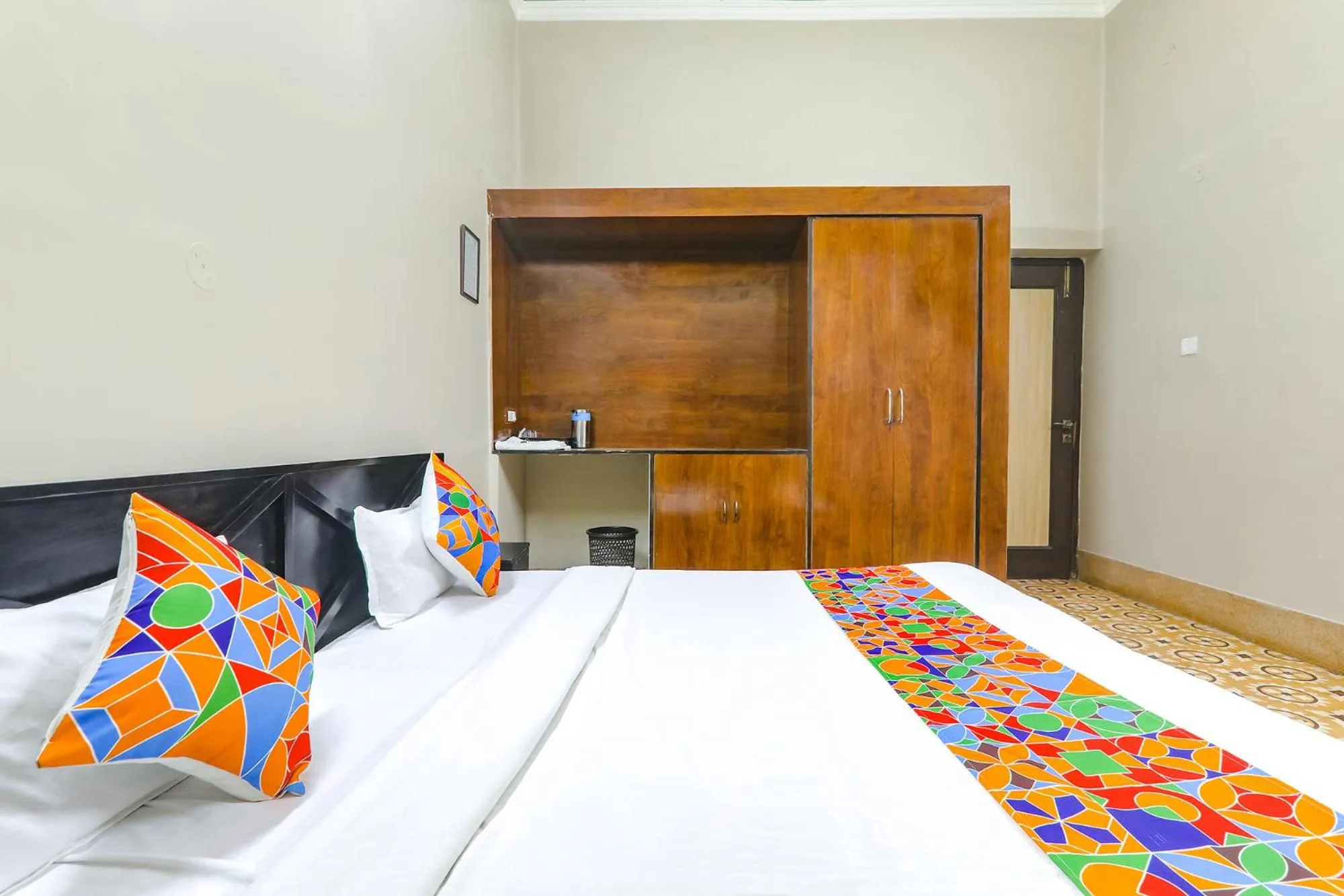 Bed in FabHotel Harmony