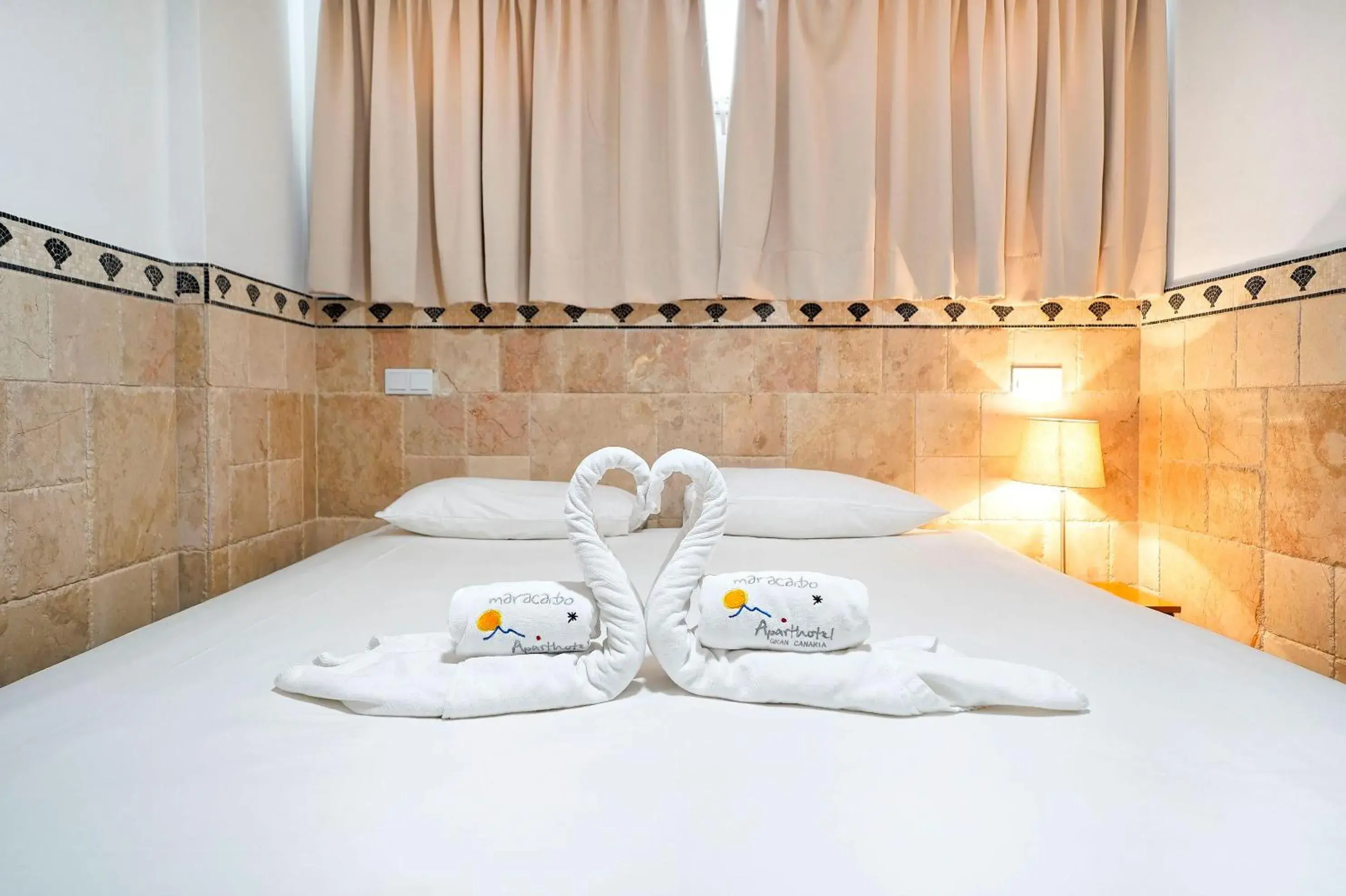 Bed in Aparthotel Maracaibo Bed in Aparthotel Maracaibo