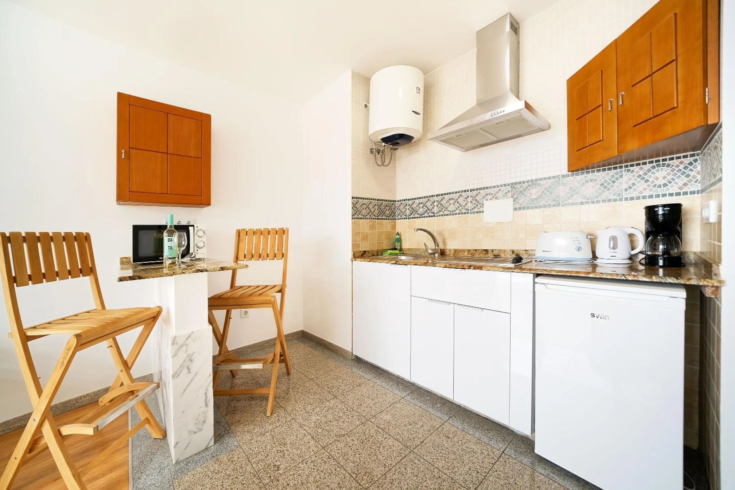 Kitchen or kitchenette in Aparthotel Maracaibo