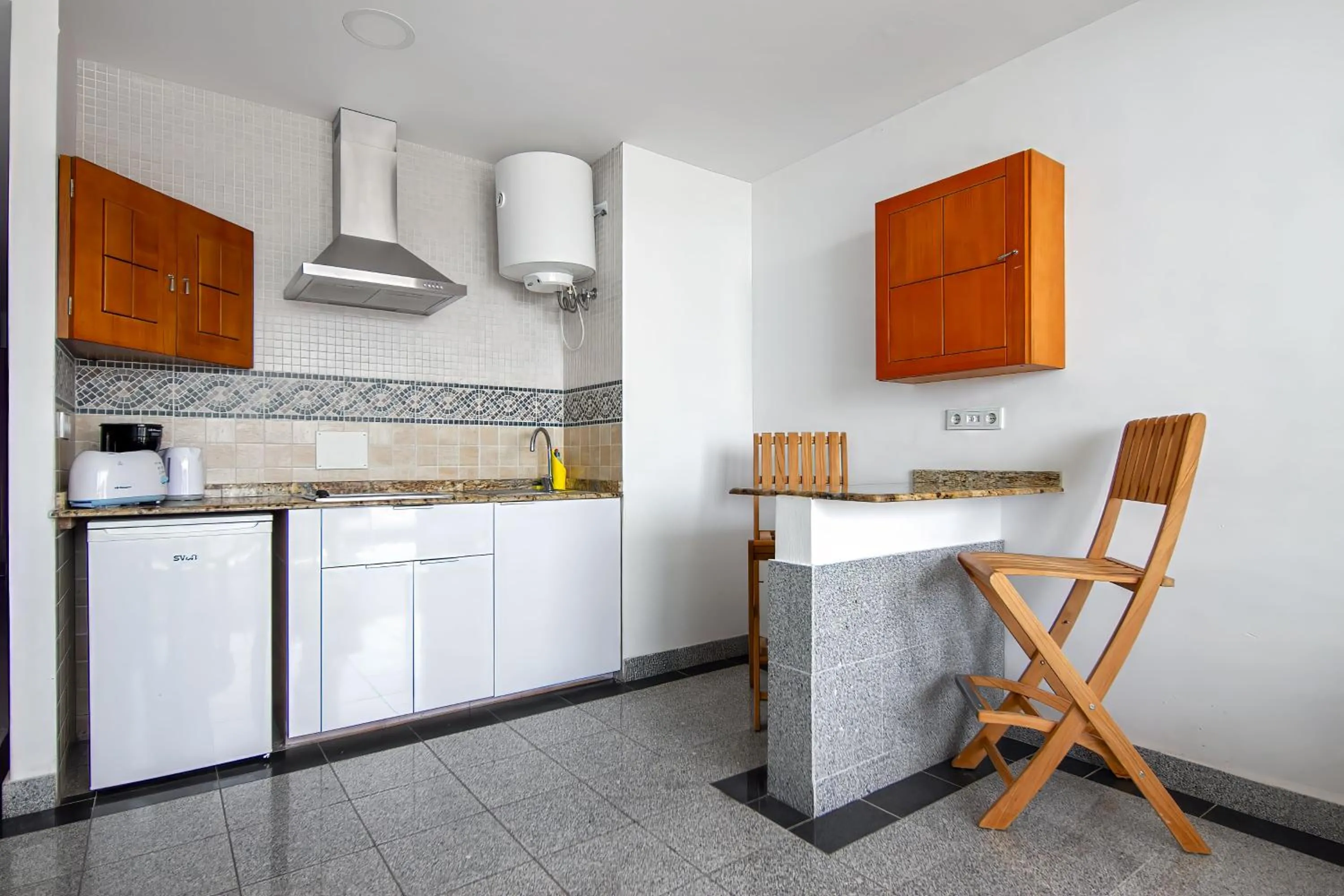Kitchen or kitchenette in Aparthotel Maracaibo