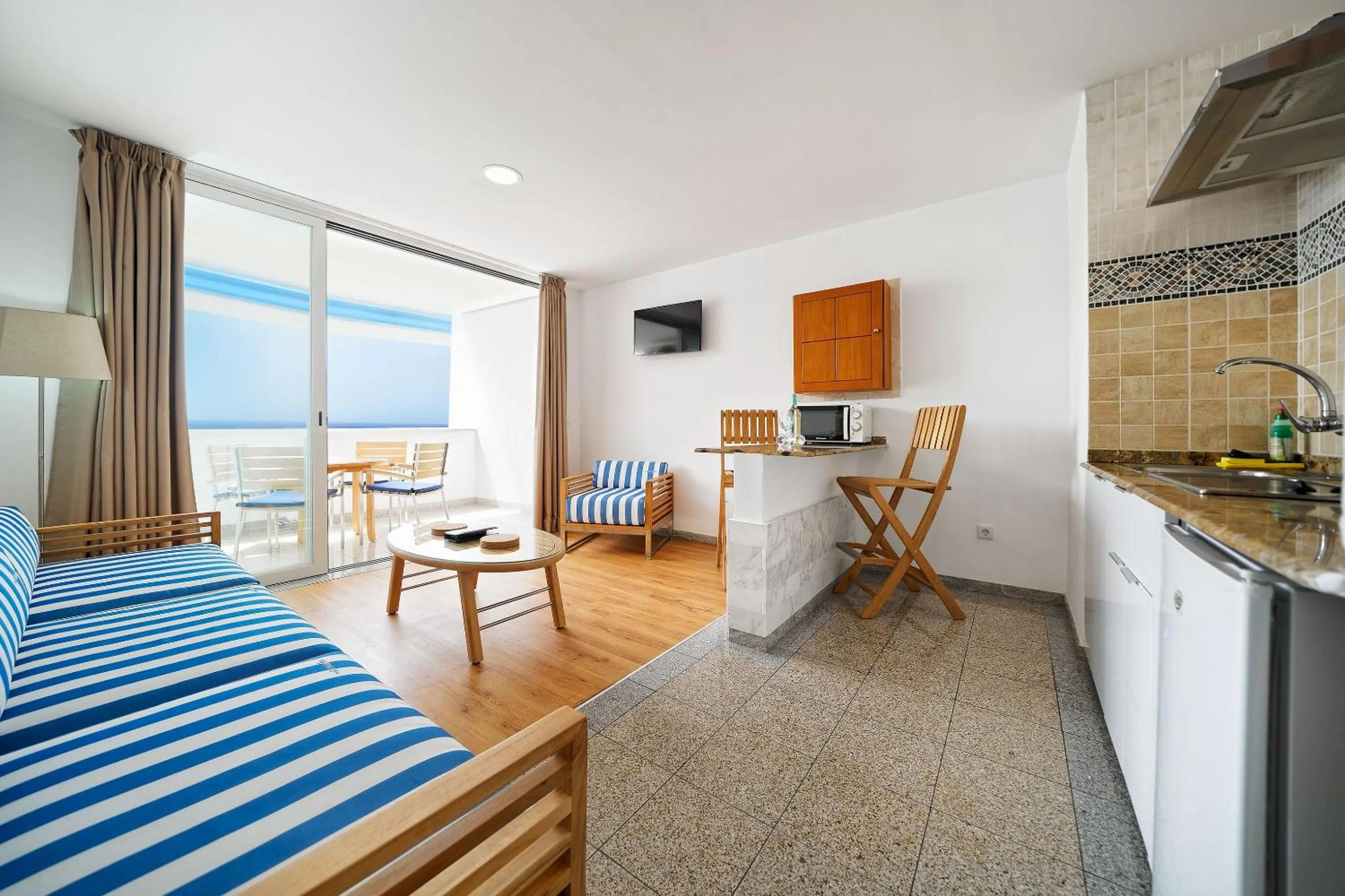 Kitchen or kitchenette, Bed in Aparthotel Maracaibo