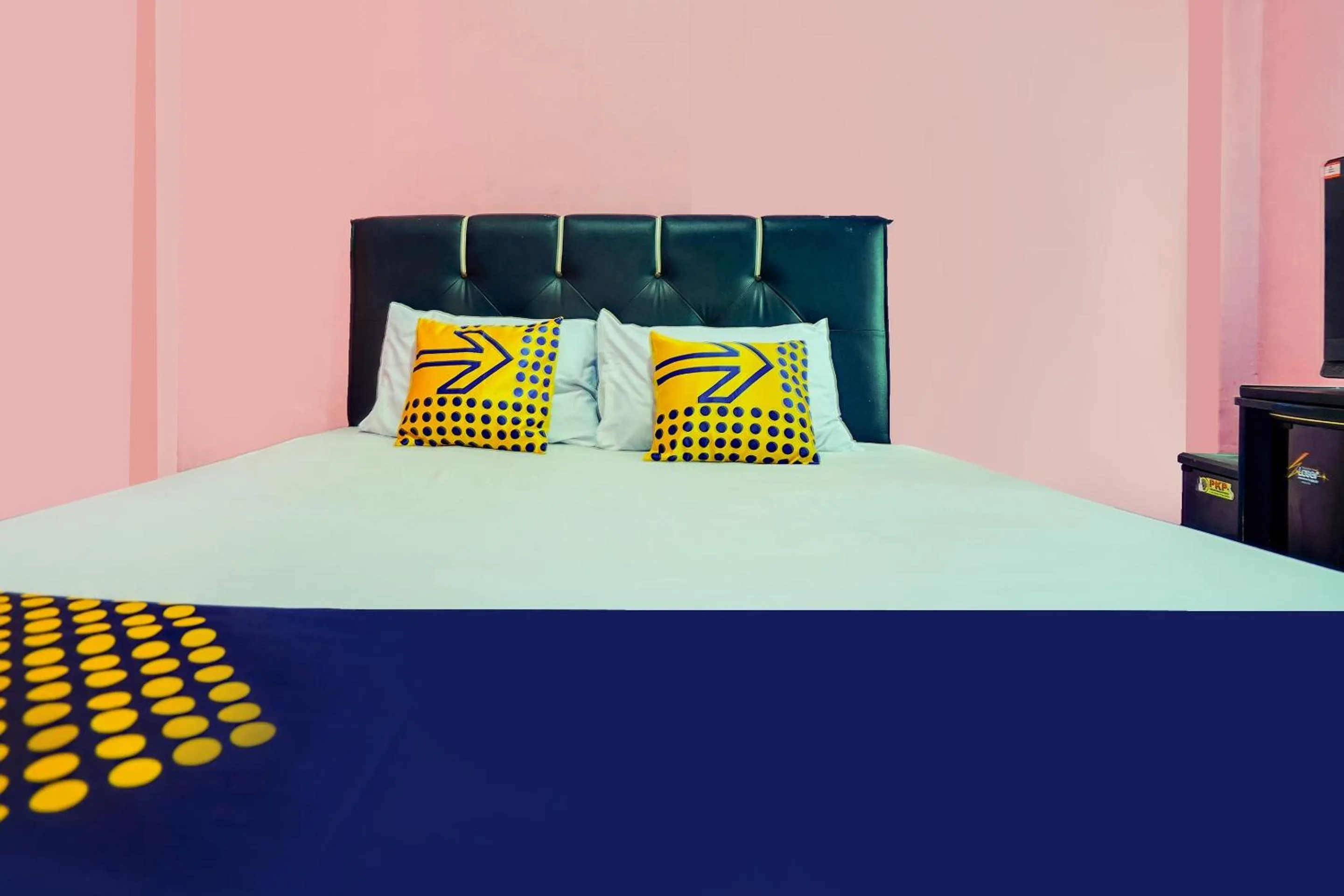 Bedroom, Bed in OYO Life 92046 Garuda Residence