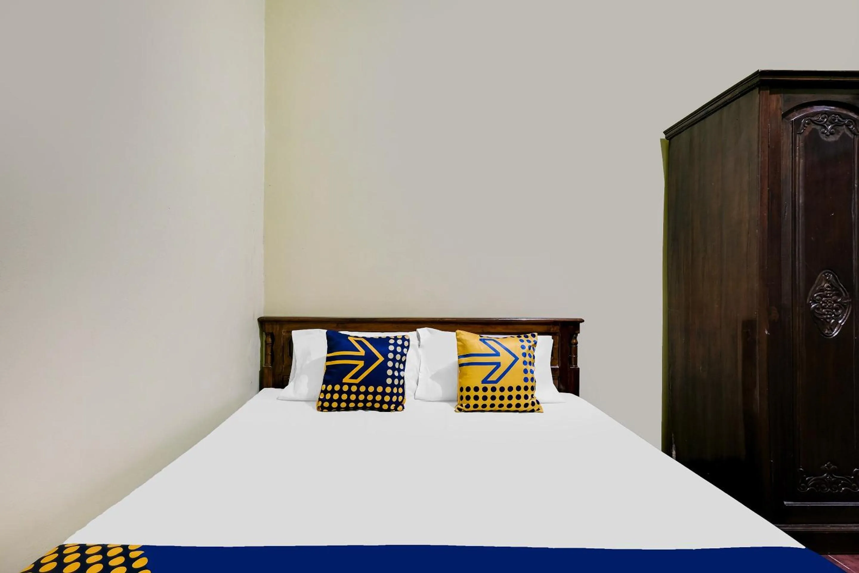 Bedroom in SPOT ON 92068 Pudja Kesuma Homestay Syariah Yogyakarta