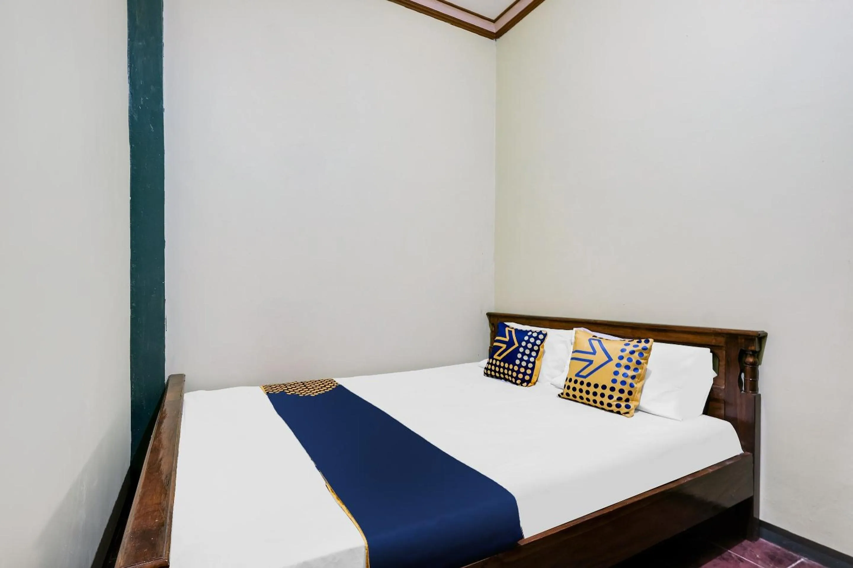 Bedroom in SPOT ON 92068 Pudja Kesuma Homestay Syariah Yogyakarta