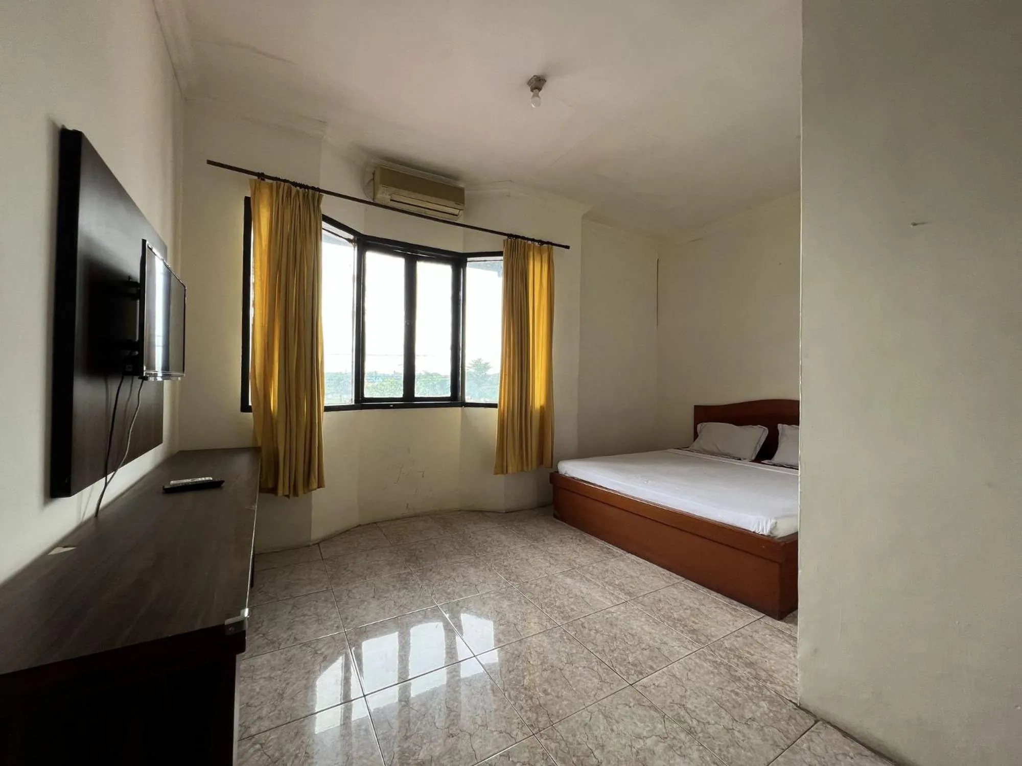 Bedroom, Bed in Hotel O Kost Orange Syariah