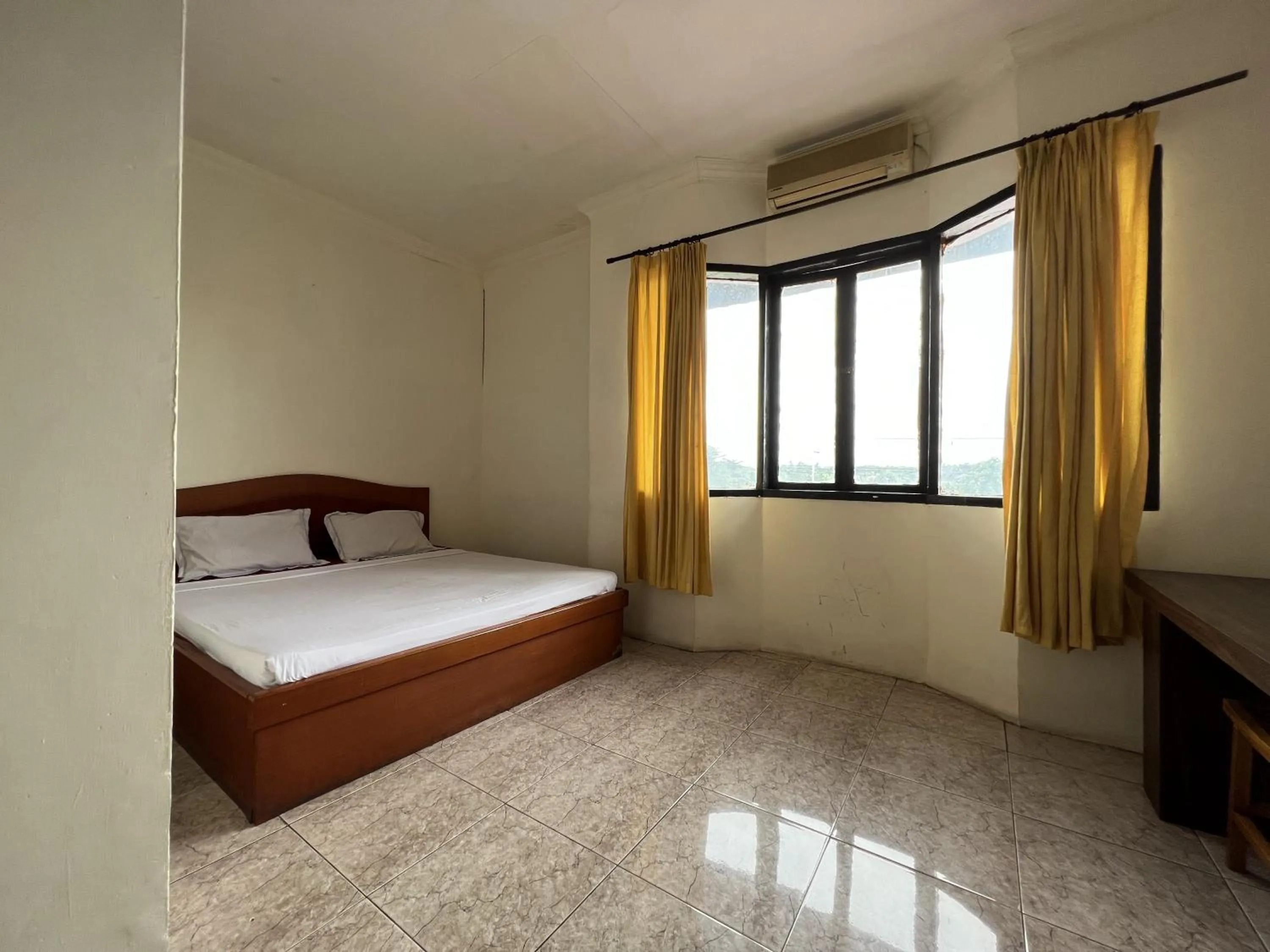 Bedroom, Bed in Hotel O Kost Orange Syariah