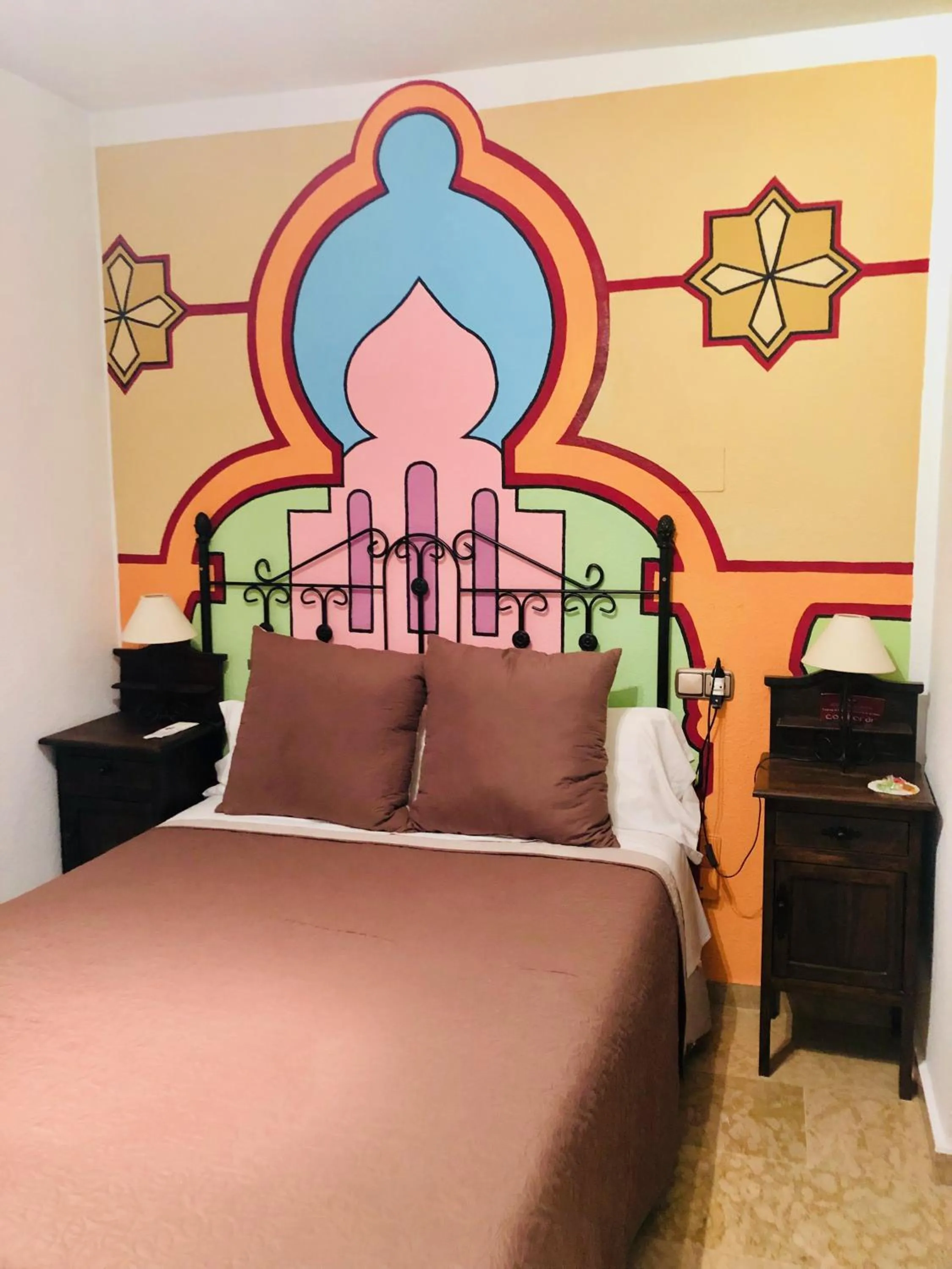 Bed in Hotel Puerta Nazarí