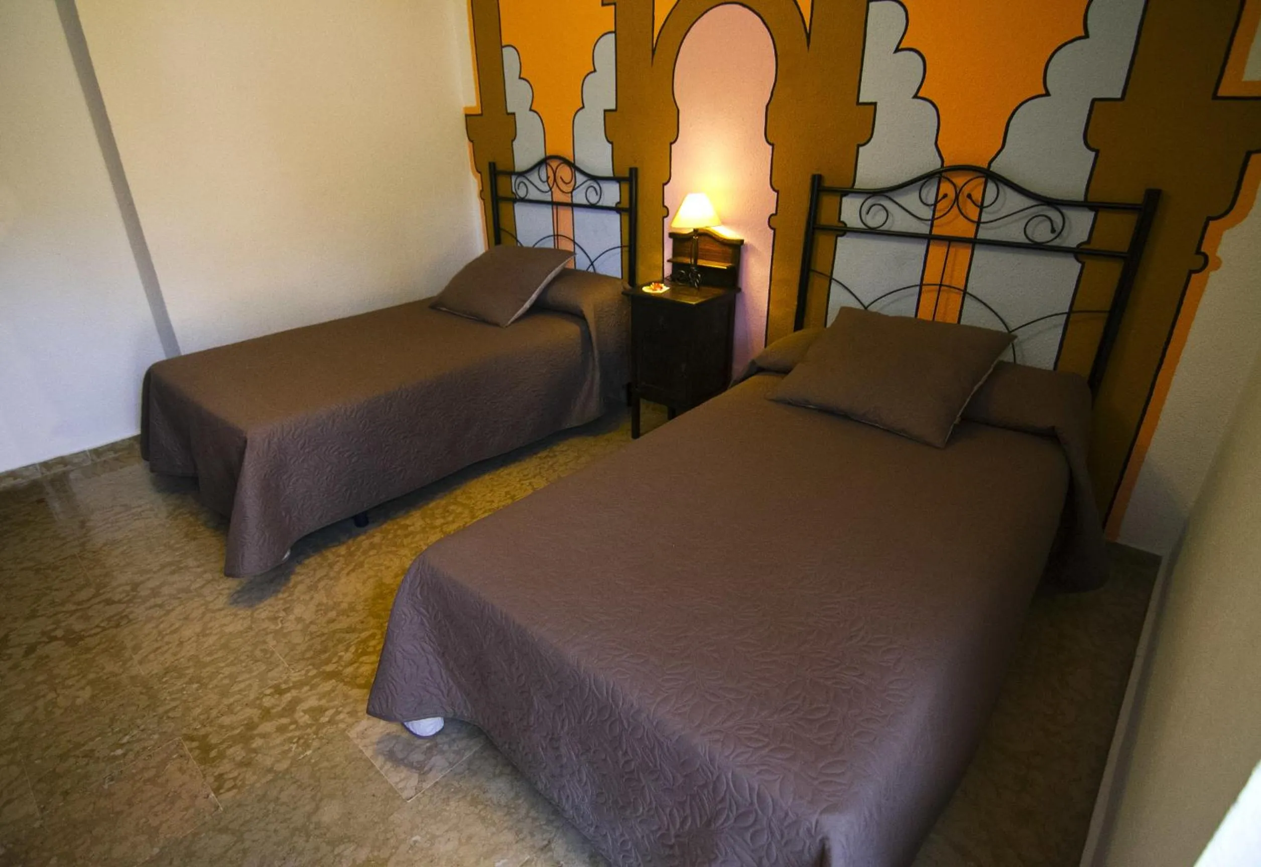 Photo of the whole room, Bed in Hotel Puerta Nazarí