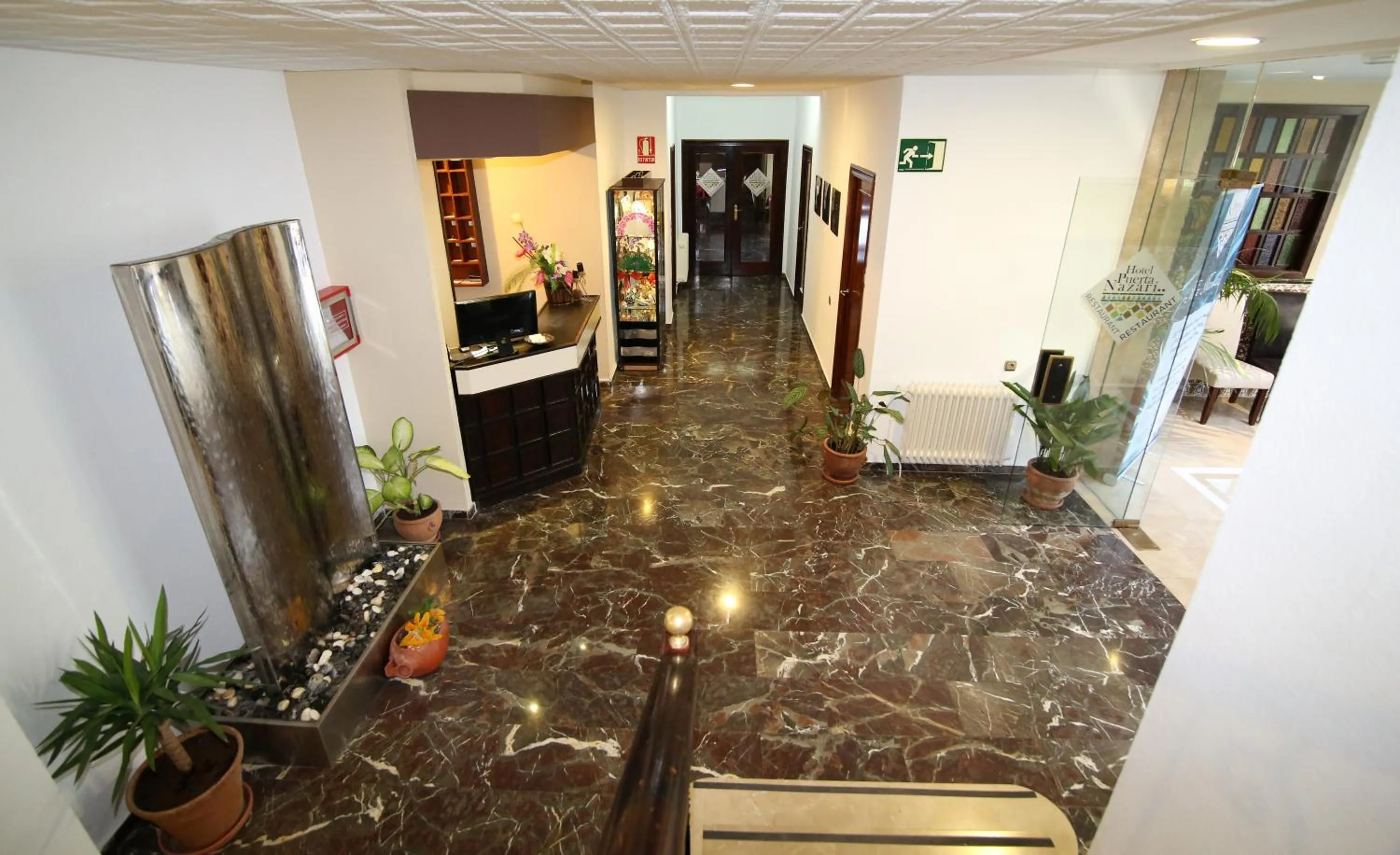 Lobby or reception in Hotel Puerta Nazarí