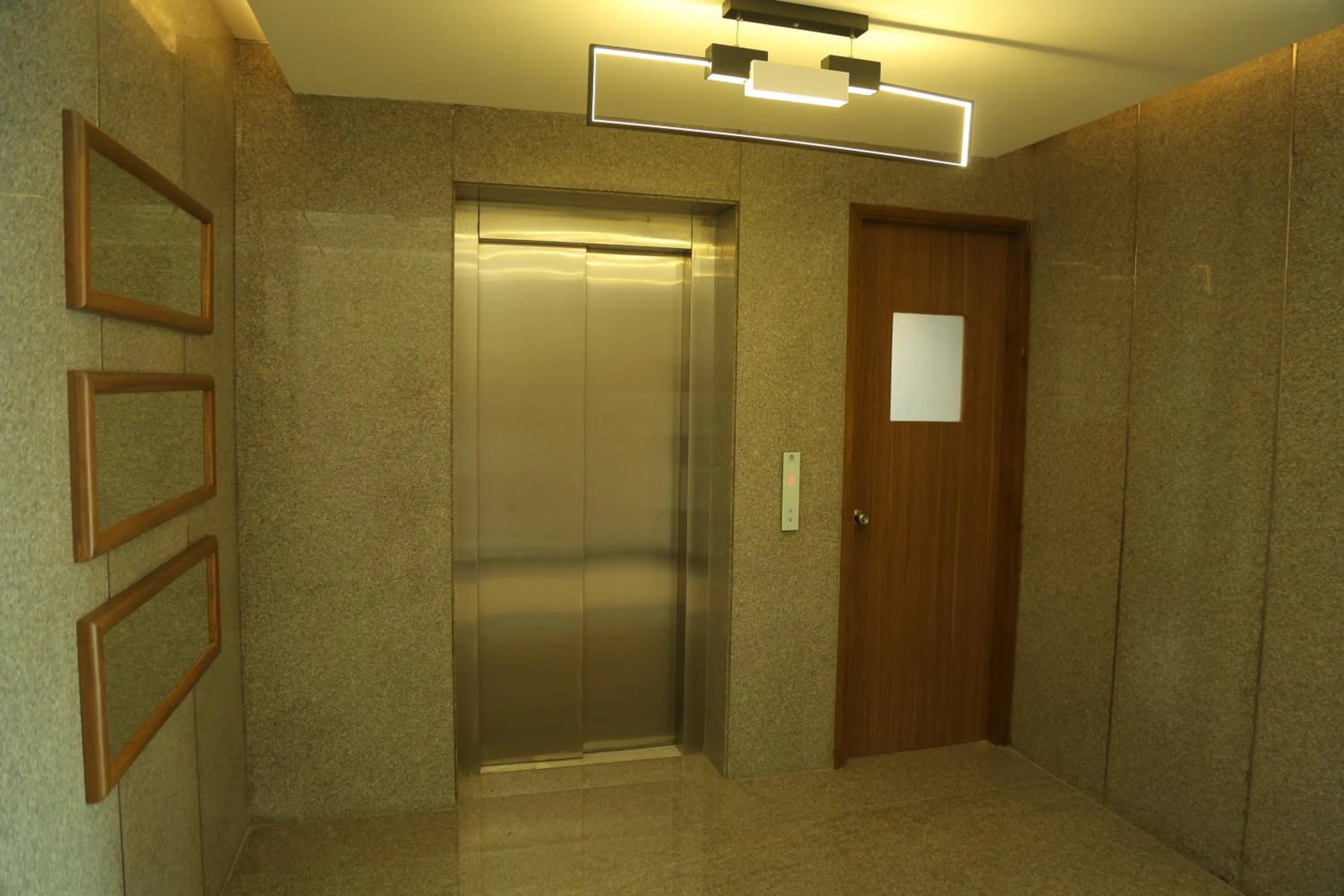 elevator in Misty Ocean - A Bergamont Group of Hotel