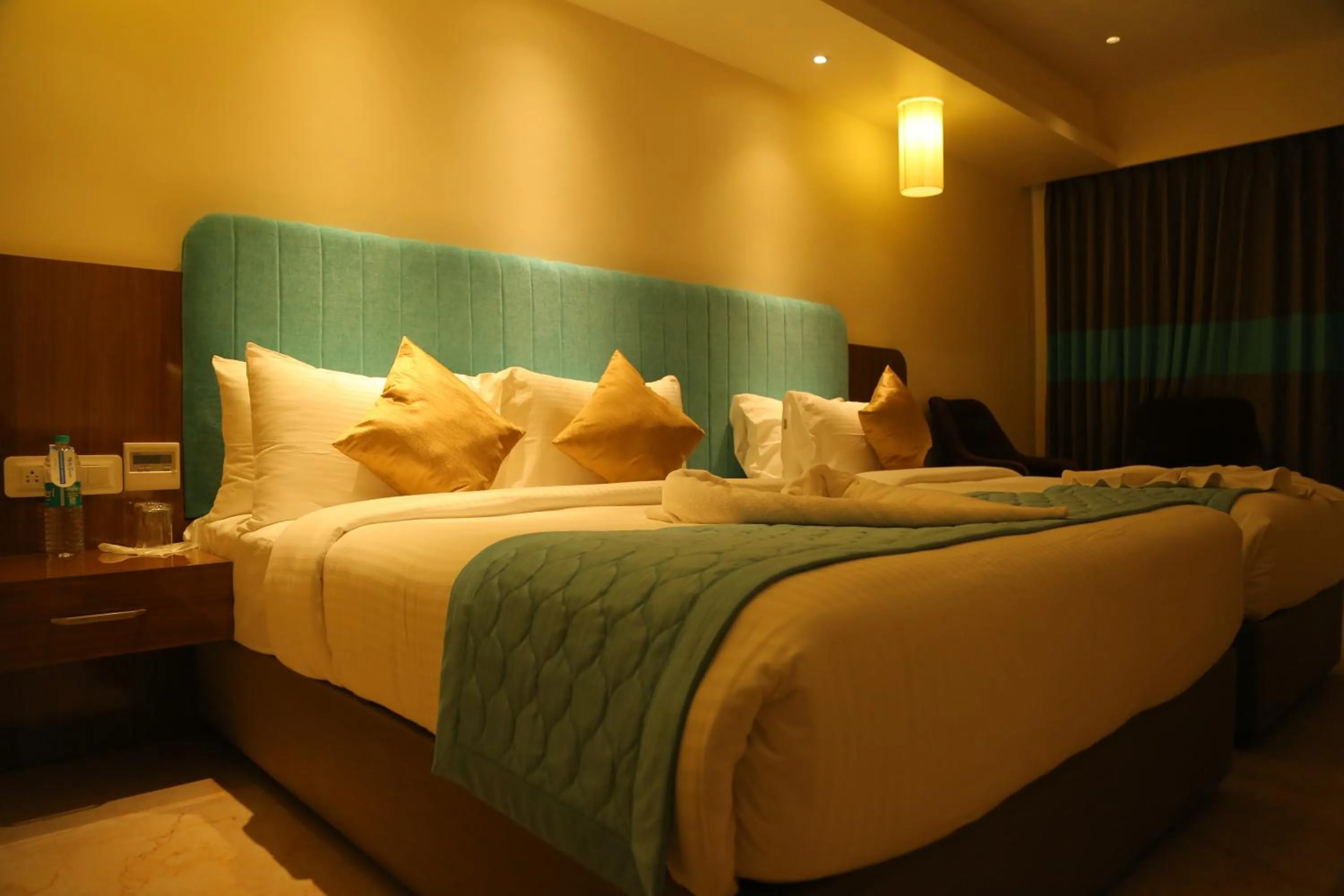 Bed in Misty Ocean - A Bergamont Group of Hotel