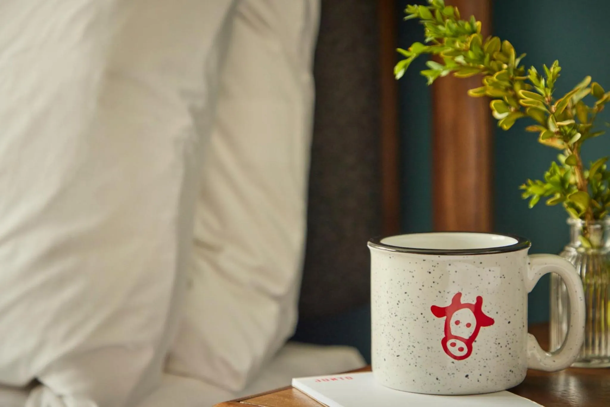 Bedroom in The Junto Hotel