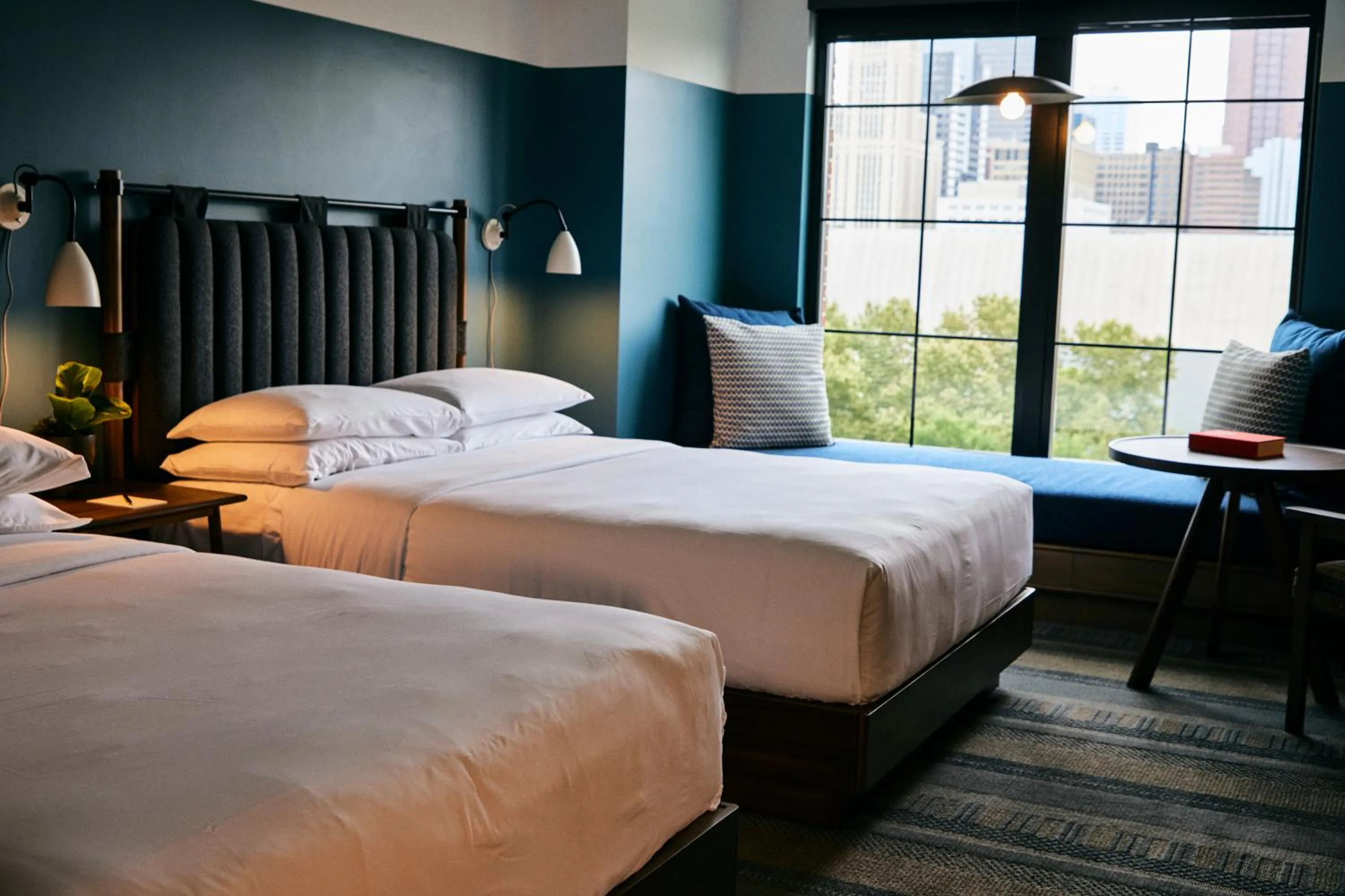 Bedroom in The Junto Hotel