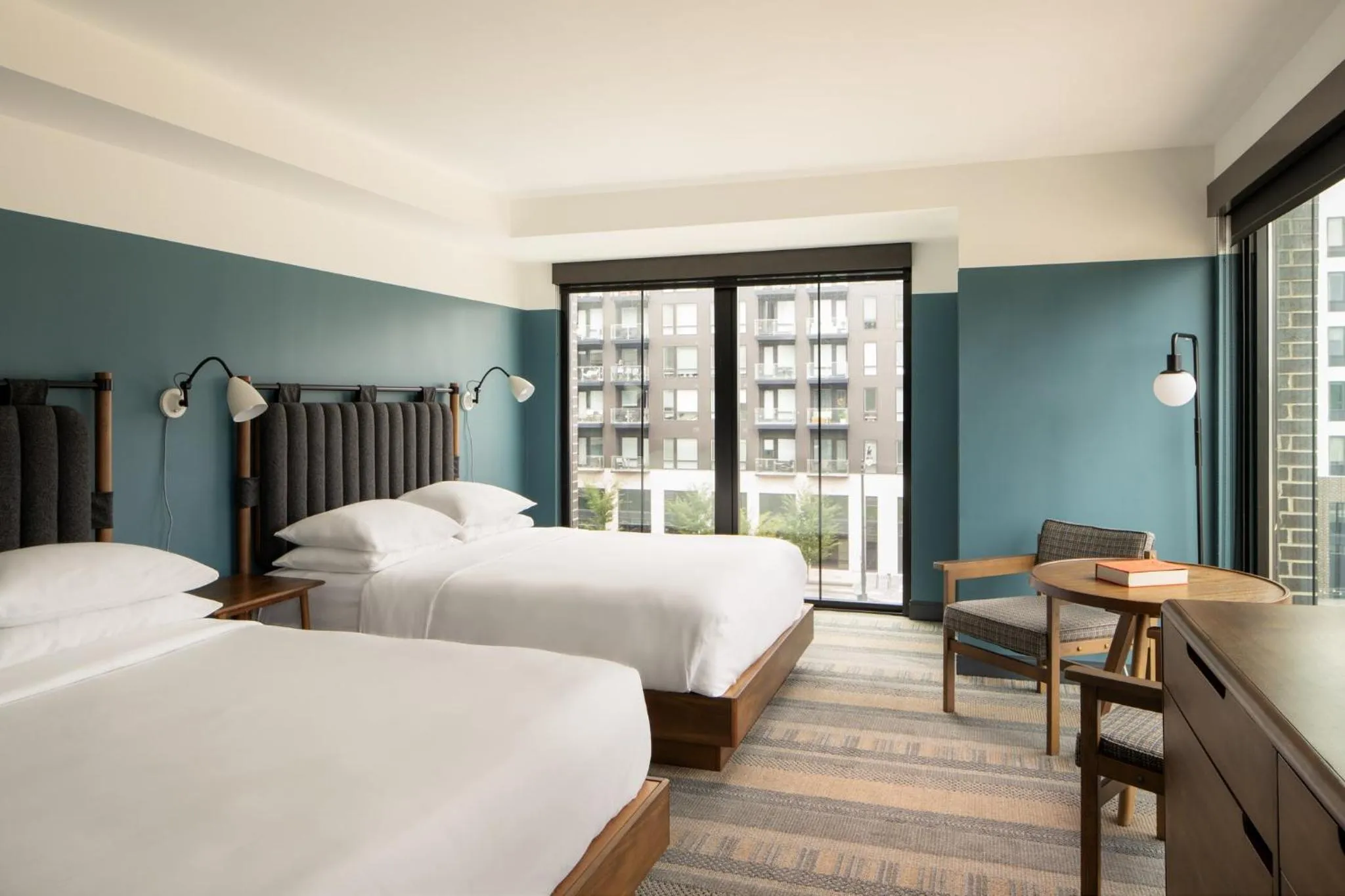 Bedroom in The Junto Hotel