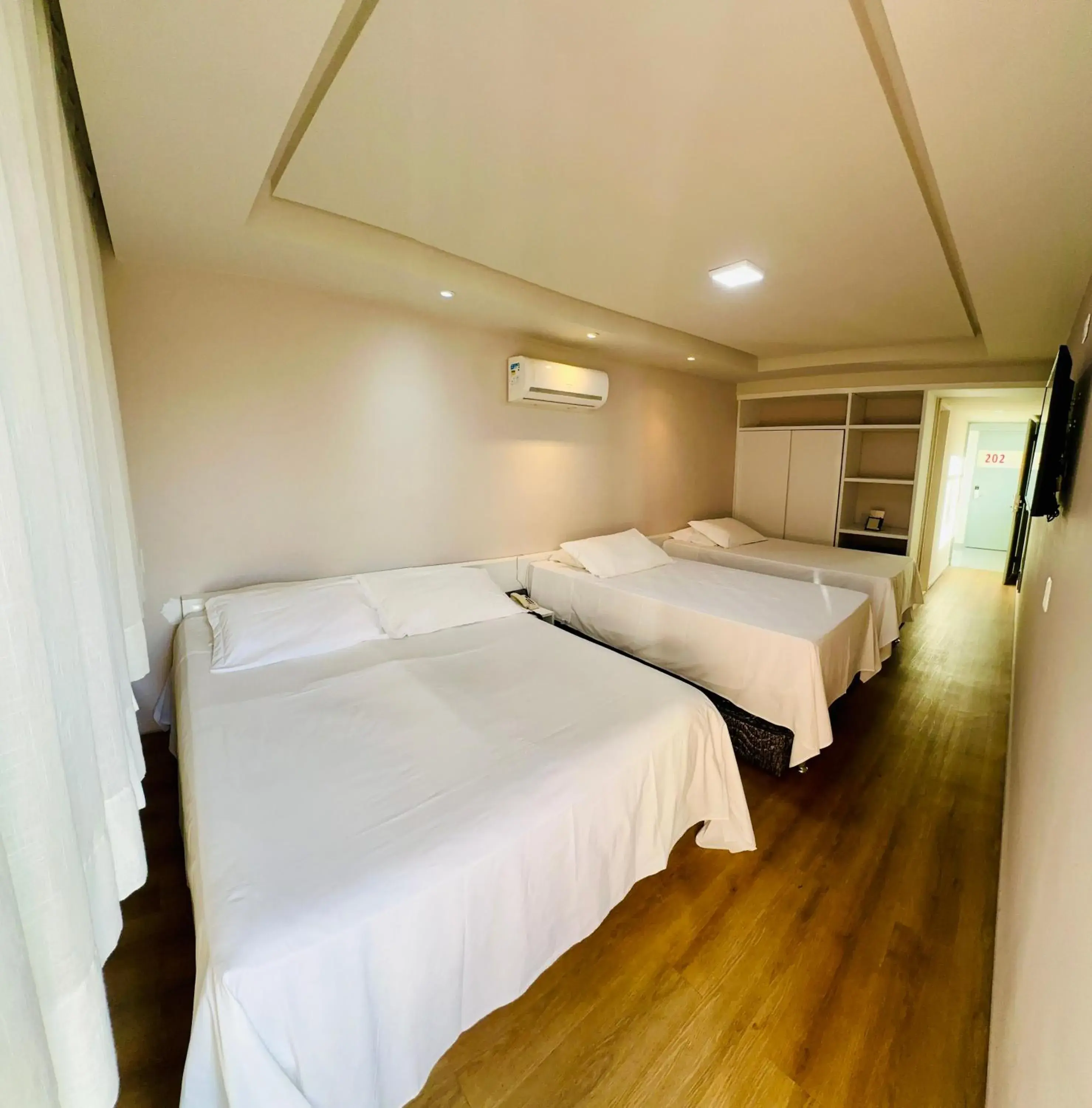 Luxury Quadruple Room - single occupancy in Garanhuns Palace Hotel Luxury Quadruple Room - single occupancy in Garanhuns Palace Hotel