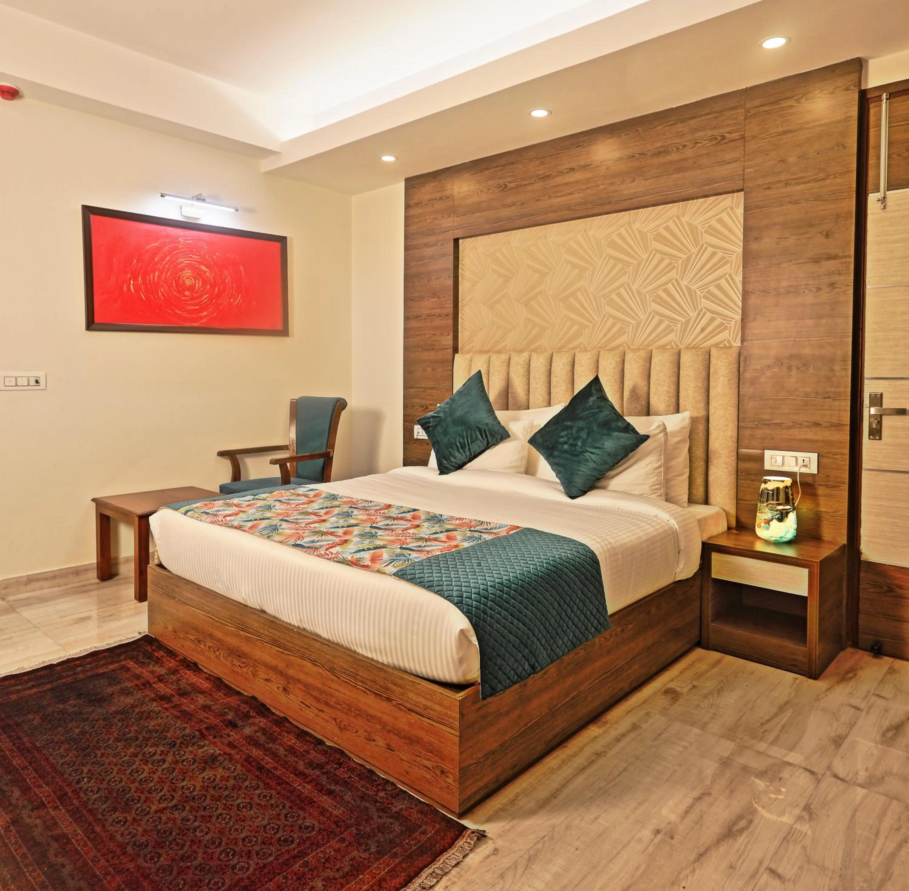 Bed in Hotel Cardinal Oxmo Delhi Airport