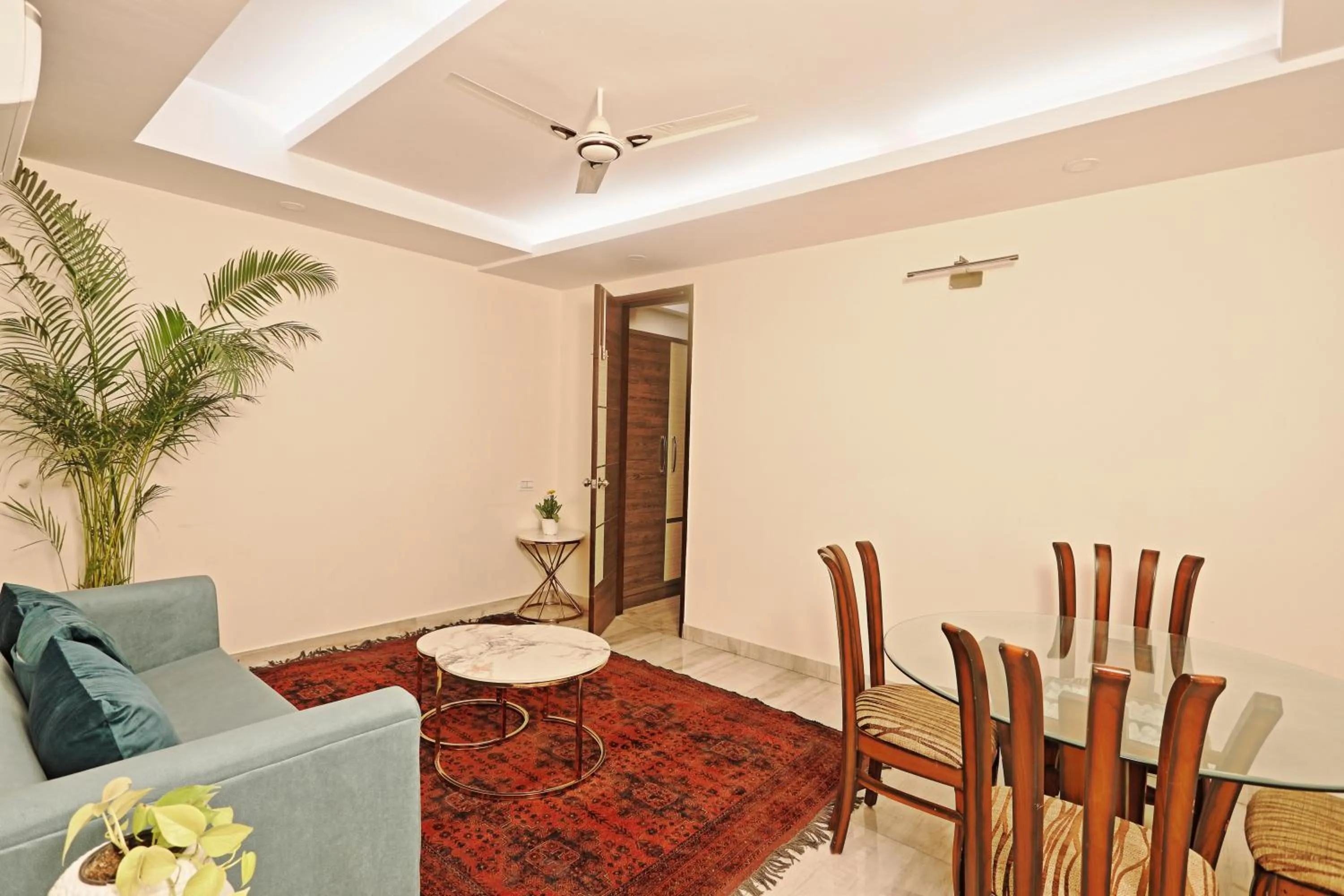 Seating area in Hotel Cardinal Oxmo Delhi Airport