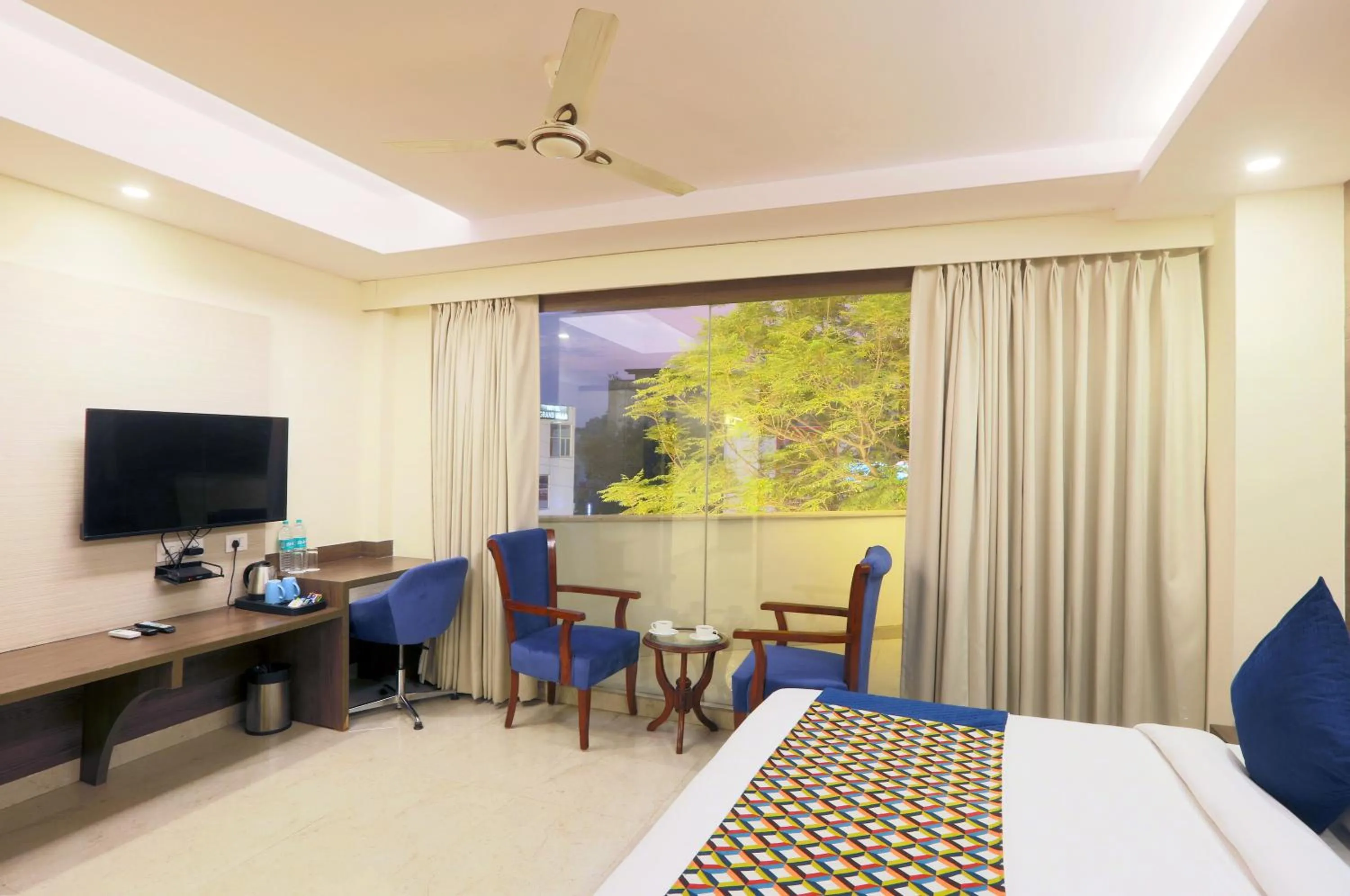 Bed in Hotel Cardinal Oxmo Delhi Airport