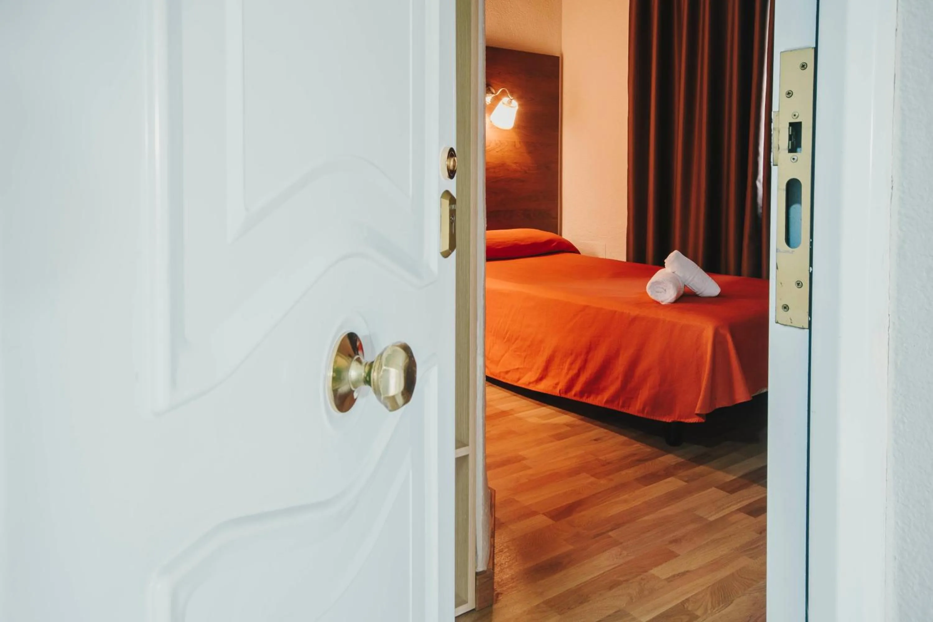 Bed in Hotel Embajador