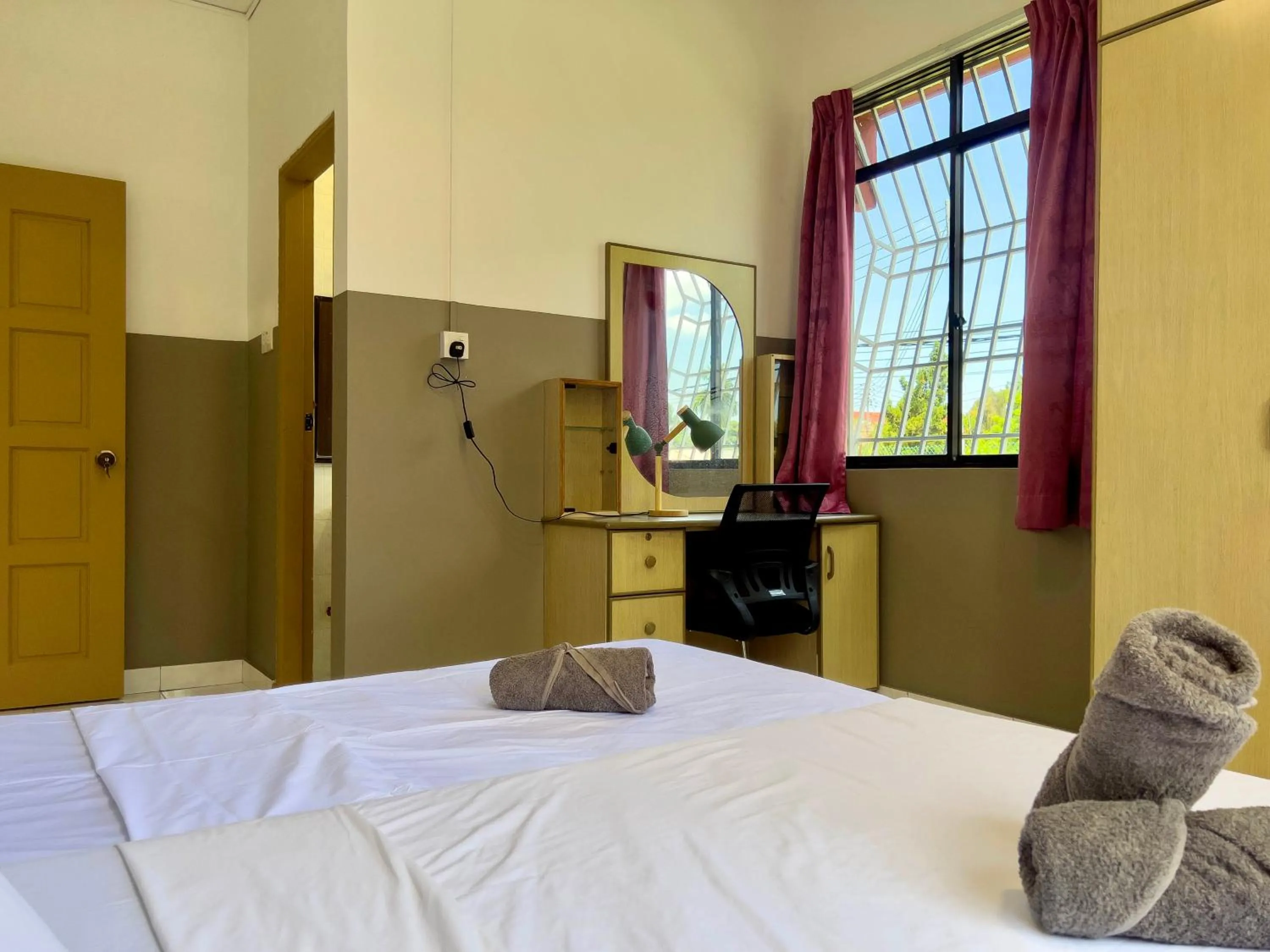 Bed in Hush Inn at Taman Penampang