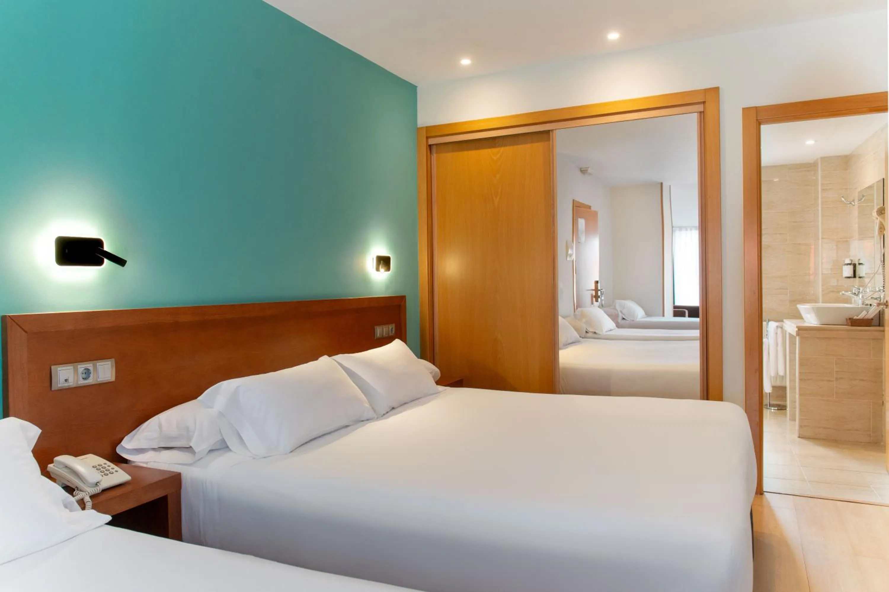 Bed in Hotel Playa Langosteira by Adeloló