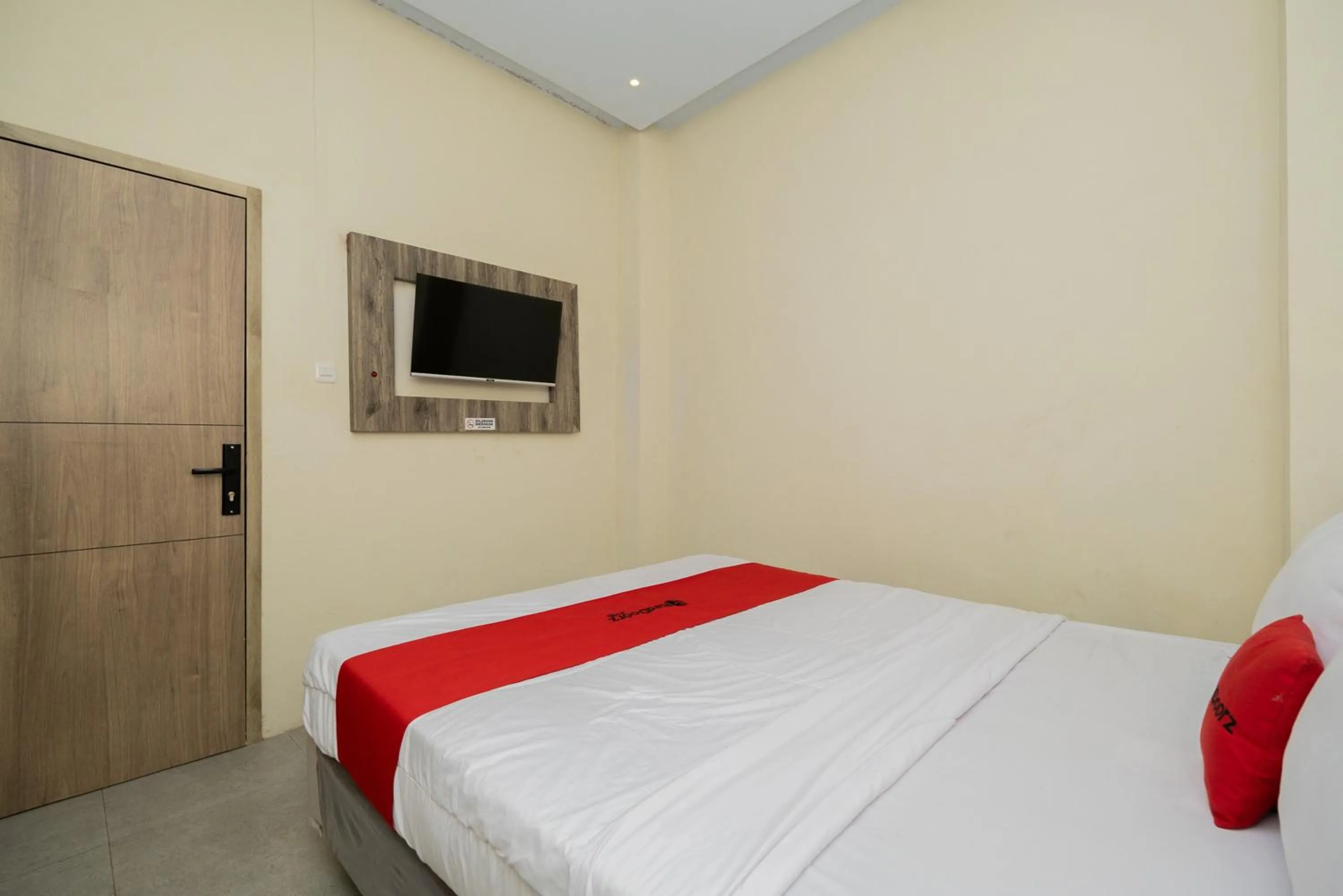 Bed in RedDoorz @ Sangnala Homestay Pakisaji