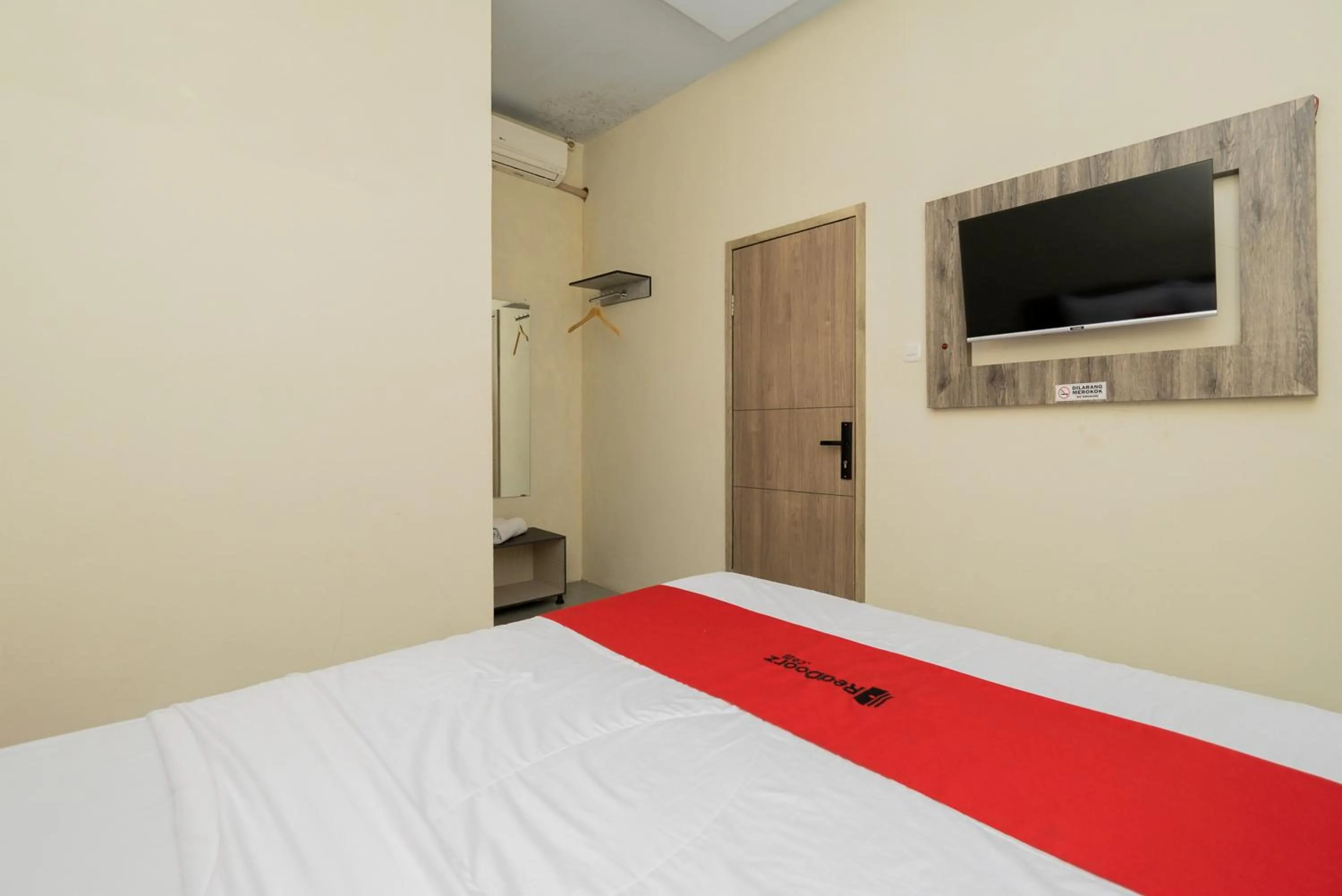 Bed in RedDoorz @ Sangnala Homestay Pakisaji