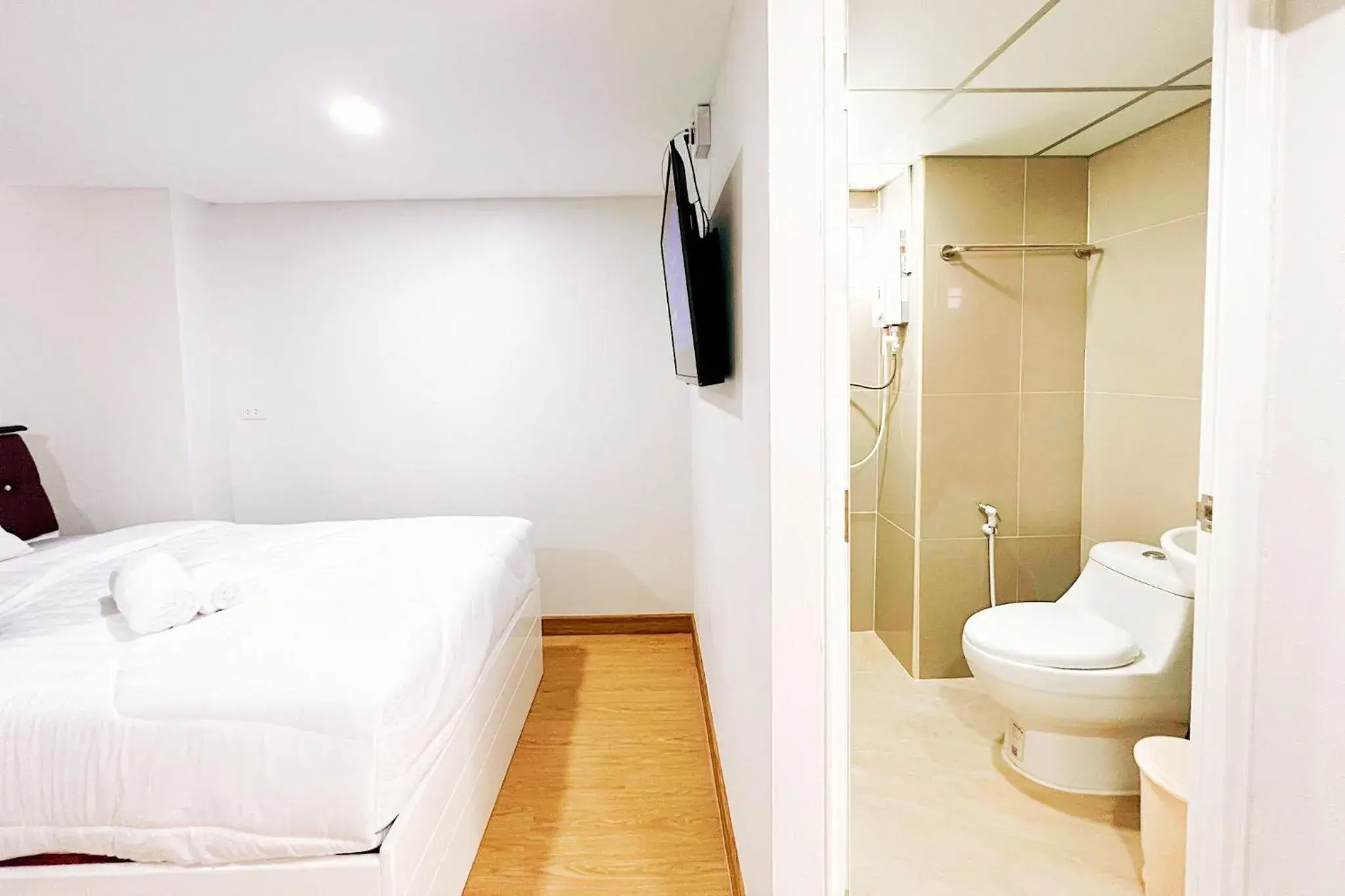 Bed in PT Grand Hotel Bed in PT Grand Hotel