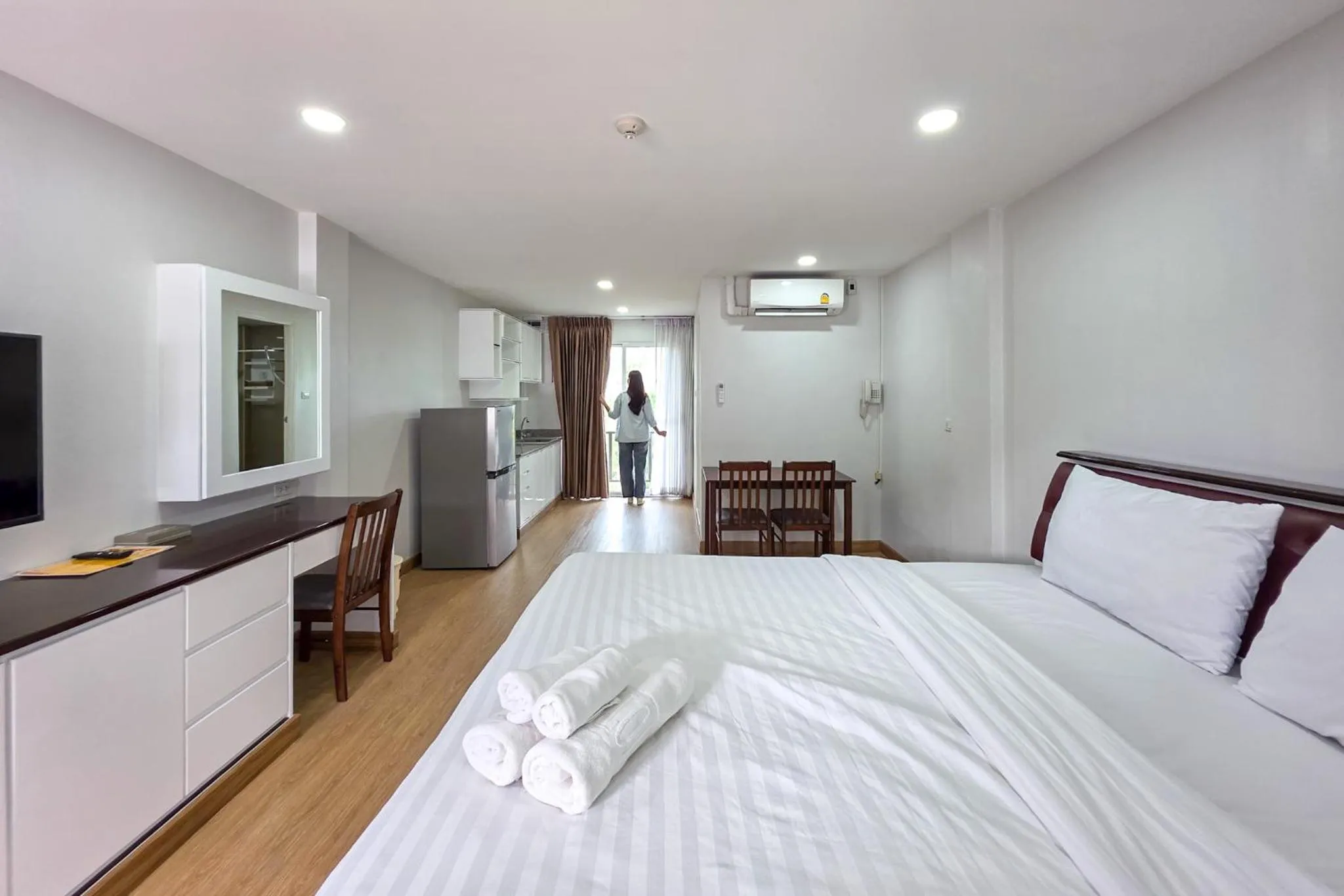 Bed in PT Grand Hotel