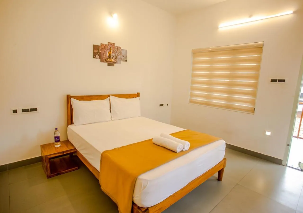 Bed in Ocean View Beach Villa Varkala by VOYE HOMES