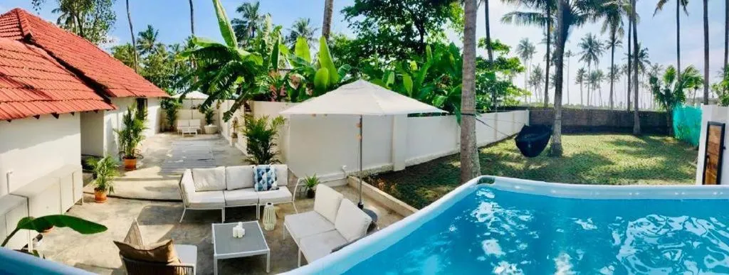 Day in Ocean View Beach Villa Varkala by VOYE HOMES