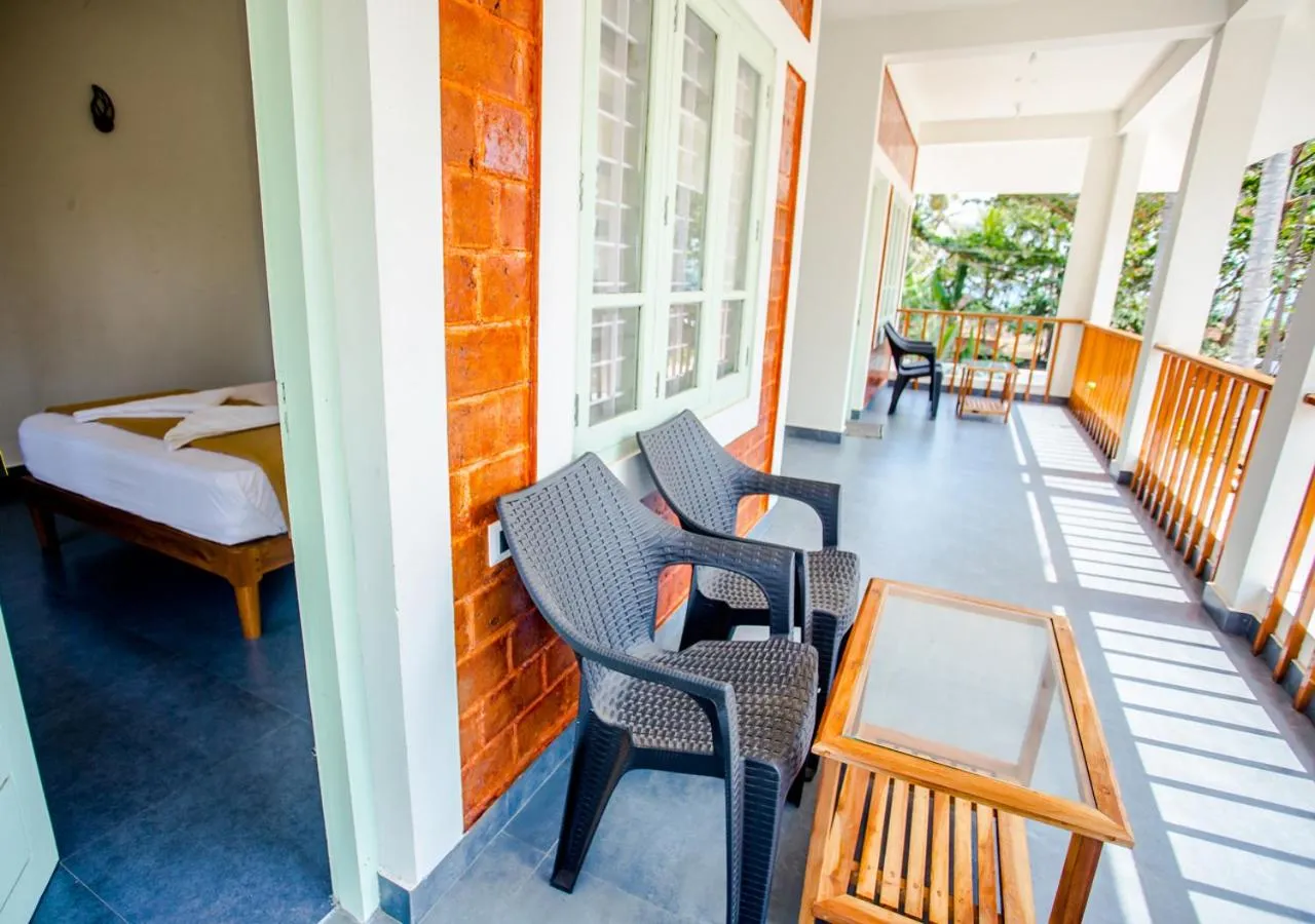 Bed in Ocean View Beach Villa Varkala by VOYE HOMES