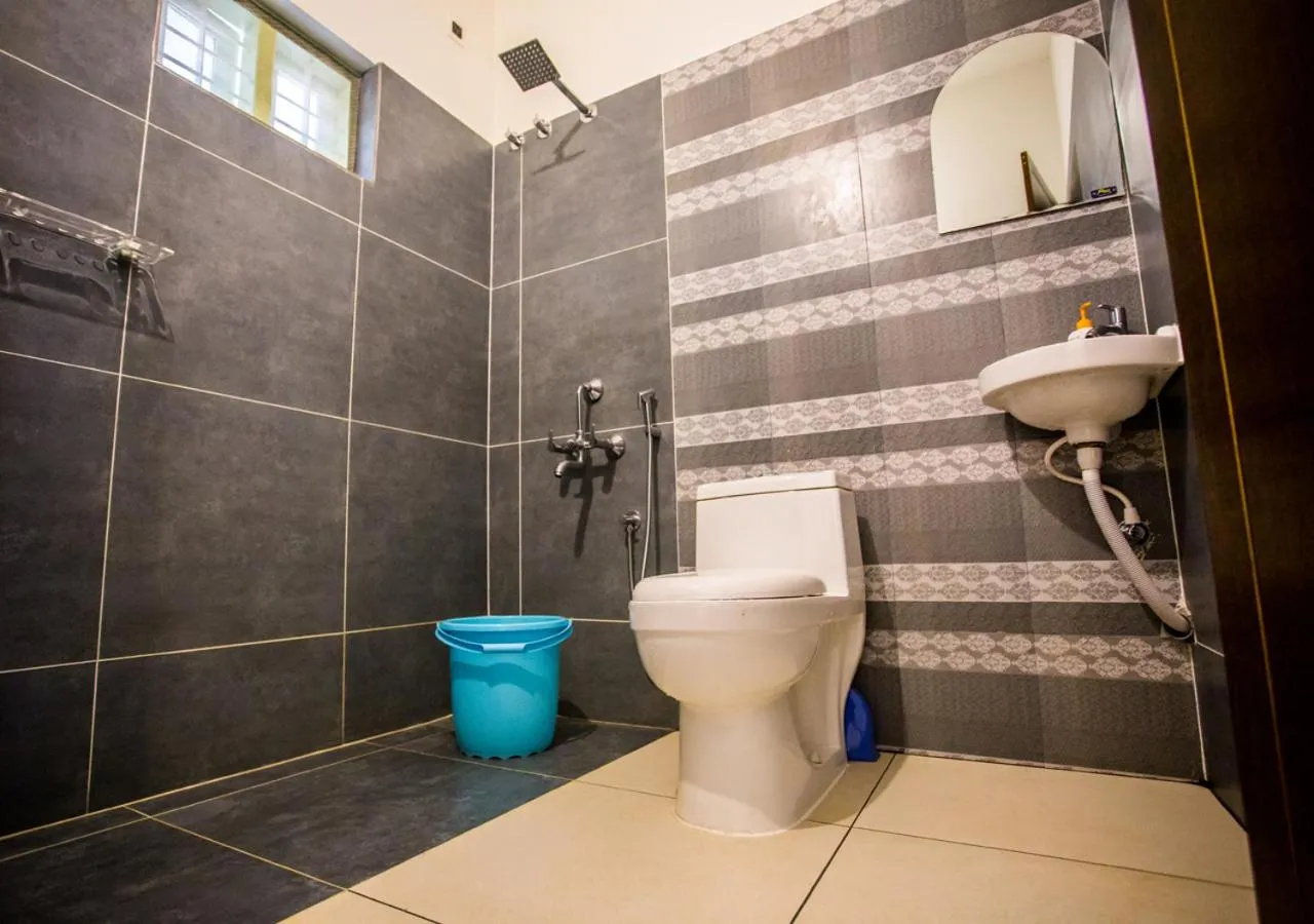 Shower in Ocean View Beach Villa Varkala by VOYE HOMES