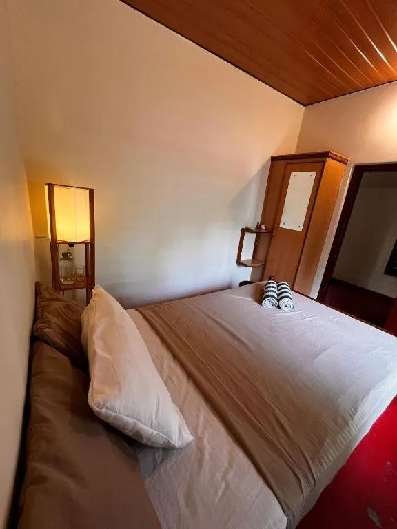 Bed in Ocean View Beach Villa Varkala by VOYE HOMES