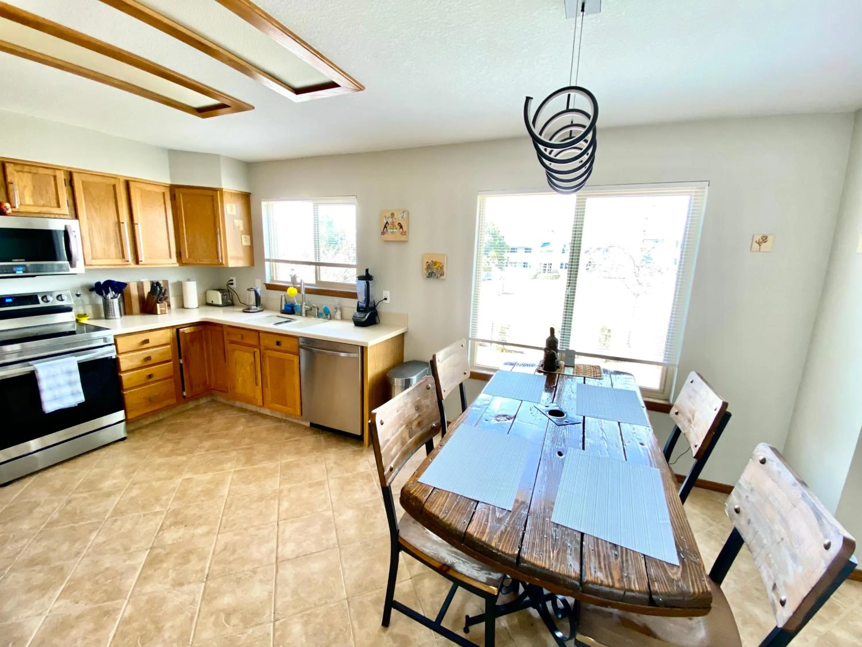 Dining area in 3br home 2br unit close to USAFA with fireplace