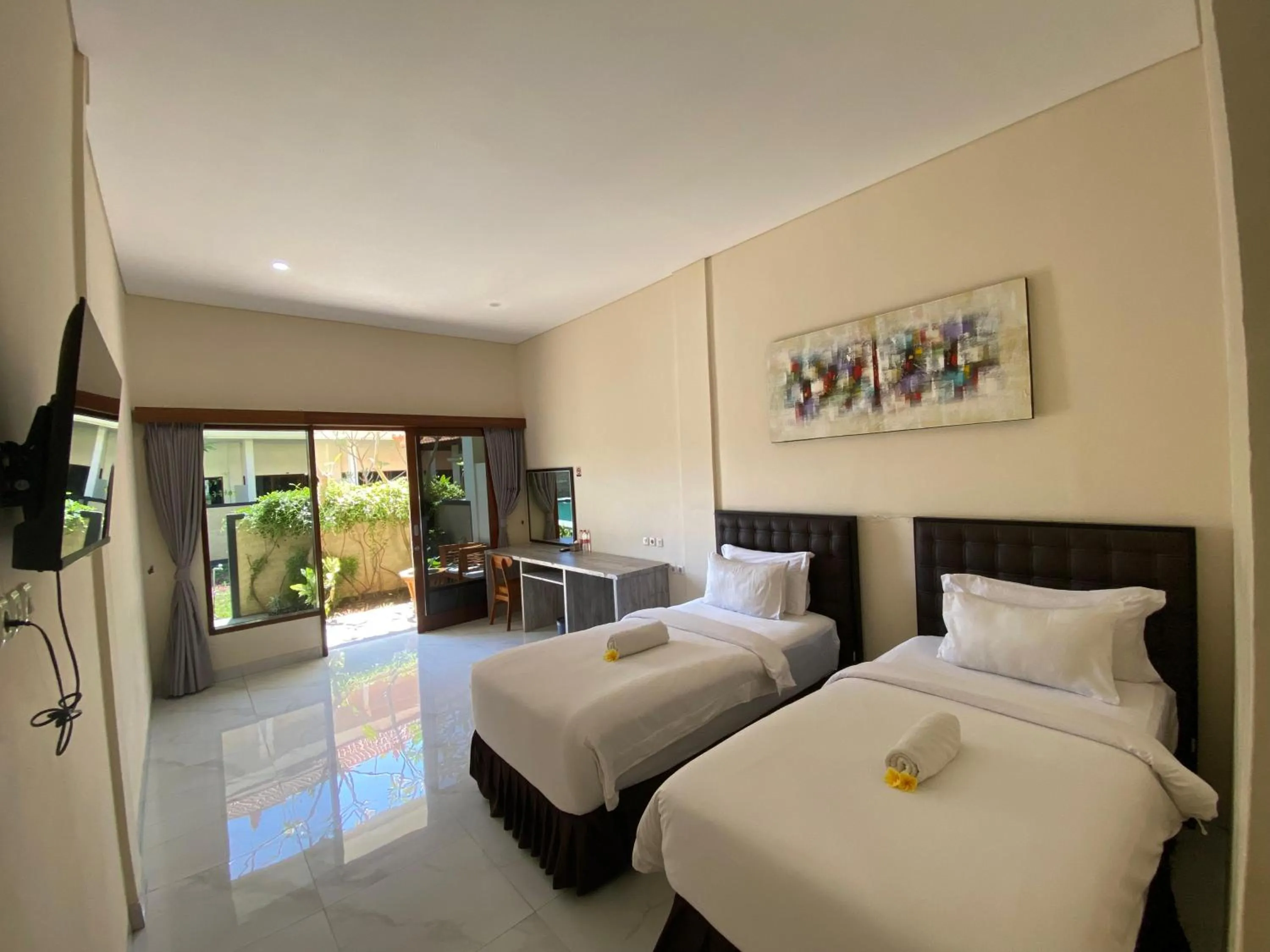 Bed in THE LAVIANA HOTEL