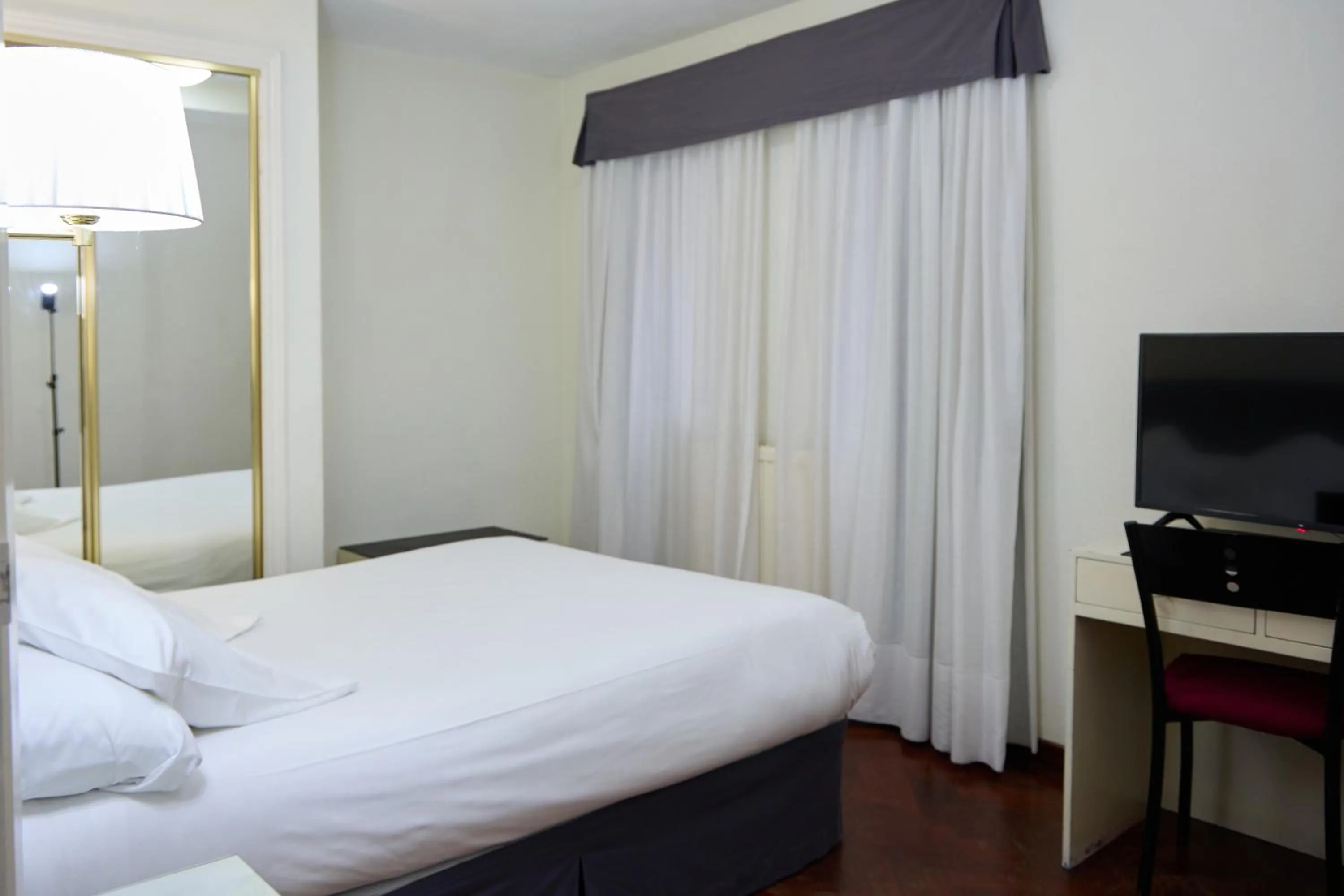 Bed in Hotel Vigo Plaza