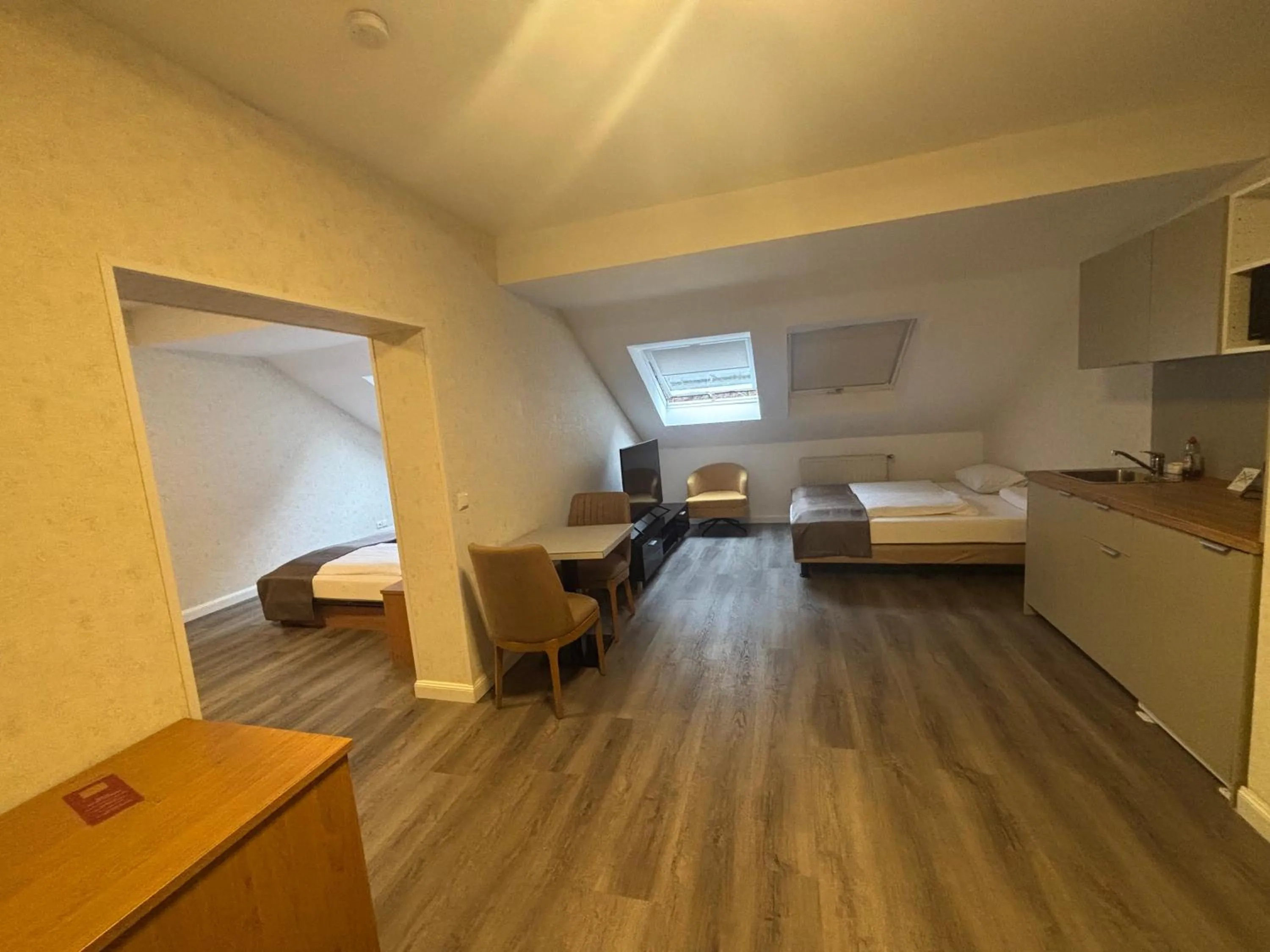 Seating area, Bed in Hotel Schlangenbader Hof