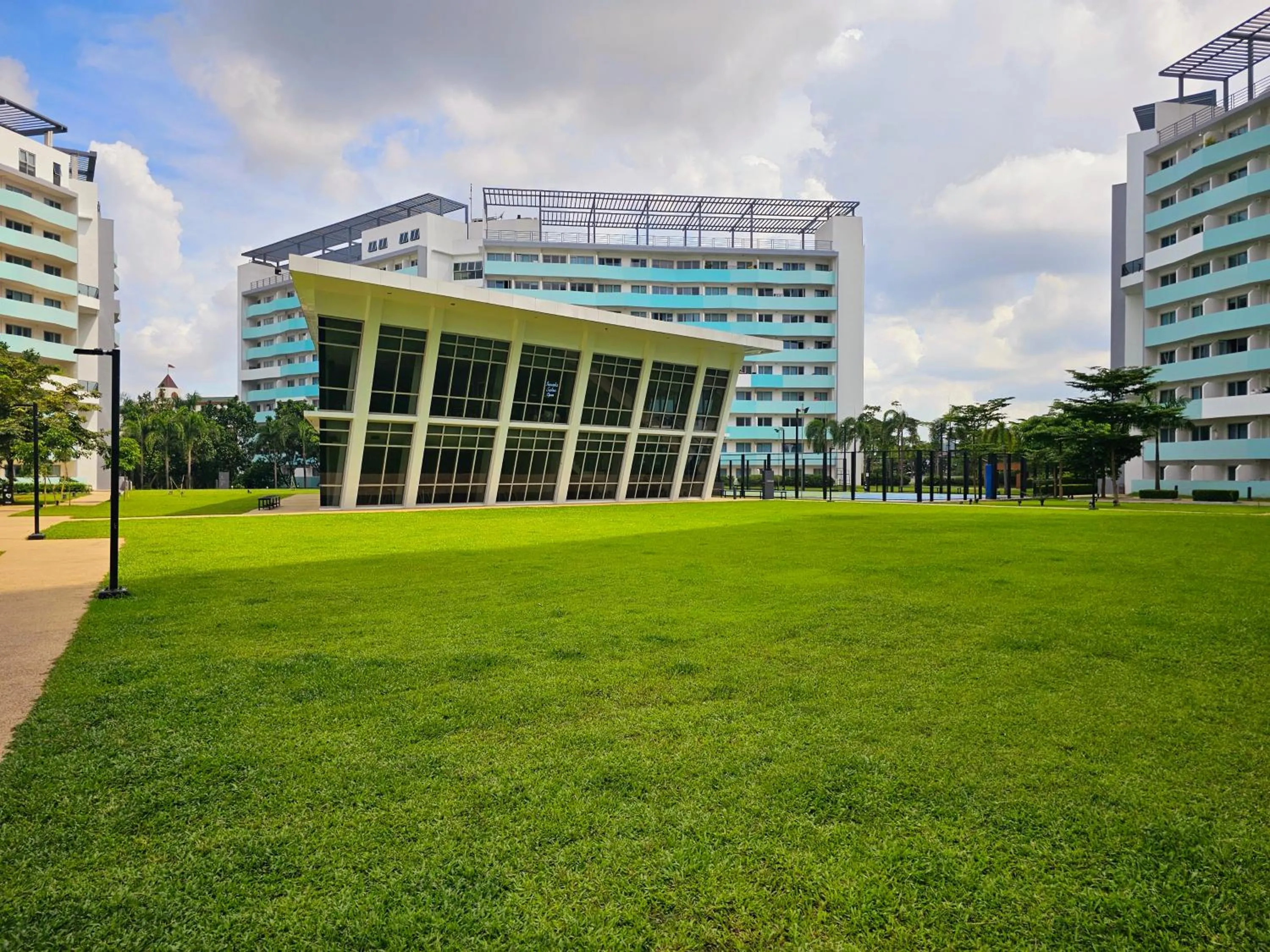 Property building in Acellyne's Suites at The Residences at Commonwealth by Century