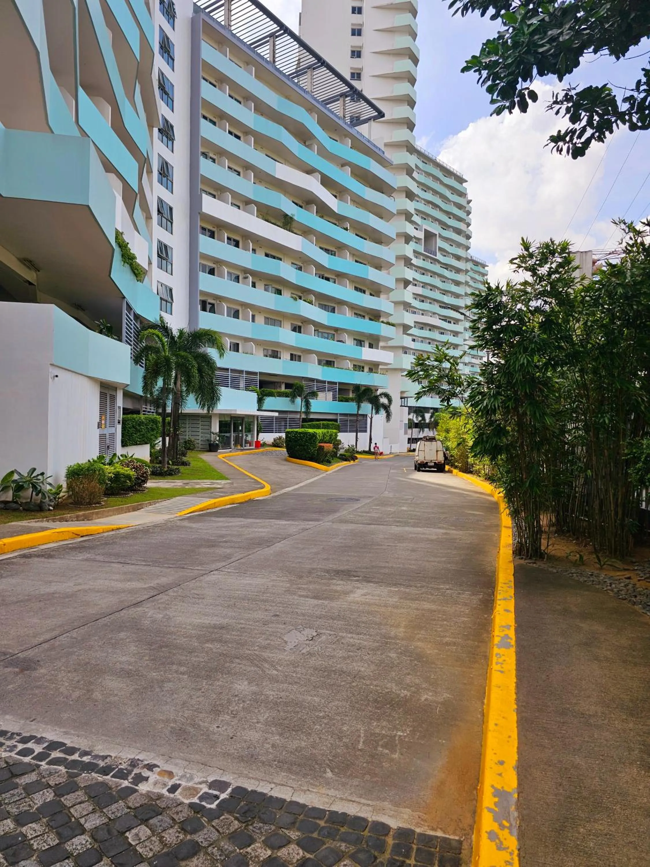 Property building in Acellyne's Suites at The Residences at Commonwealth by Century