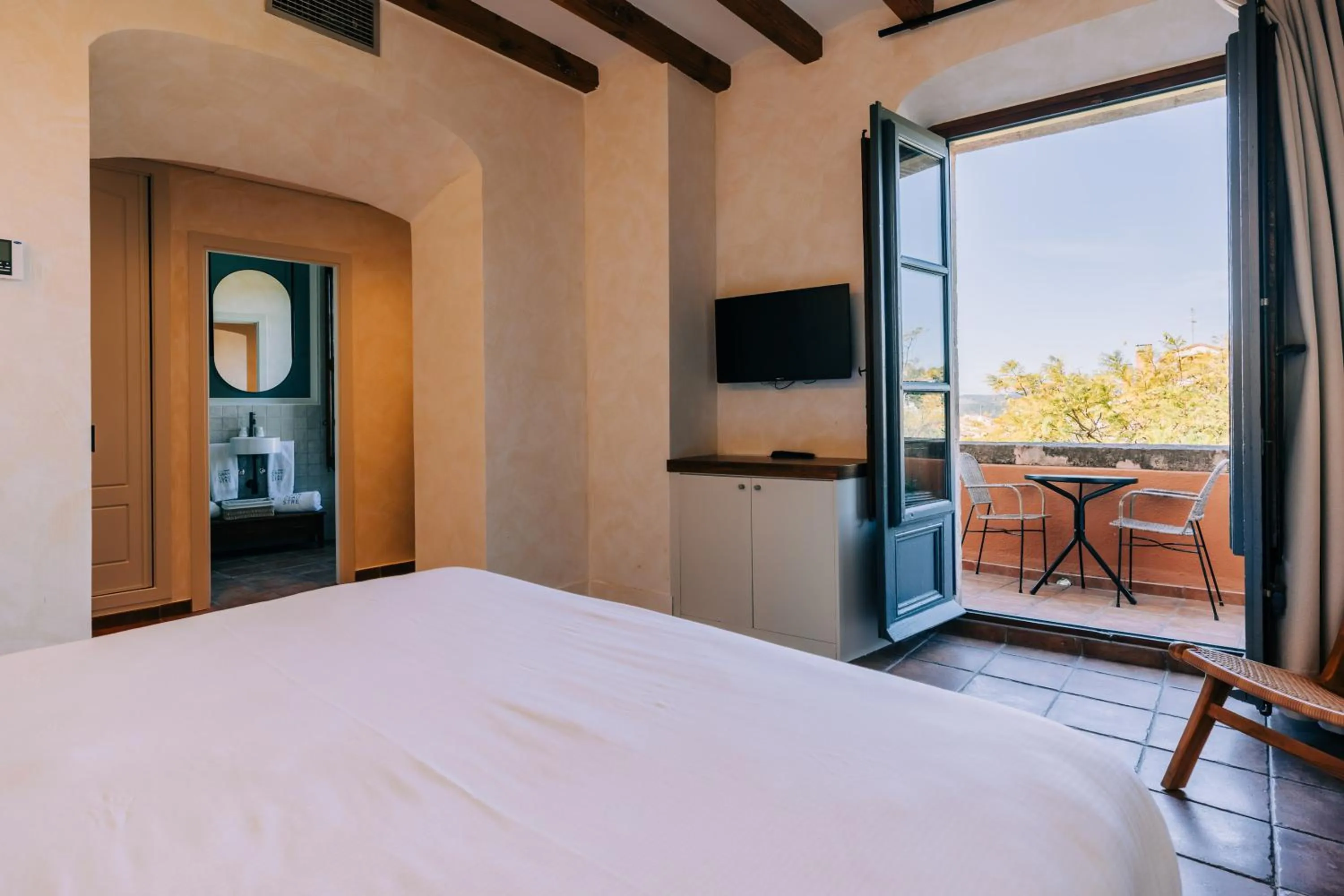 Bed in Gran Claustre Boutique Hotel