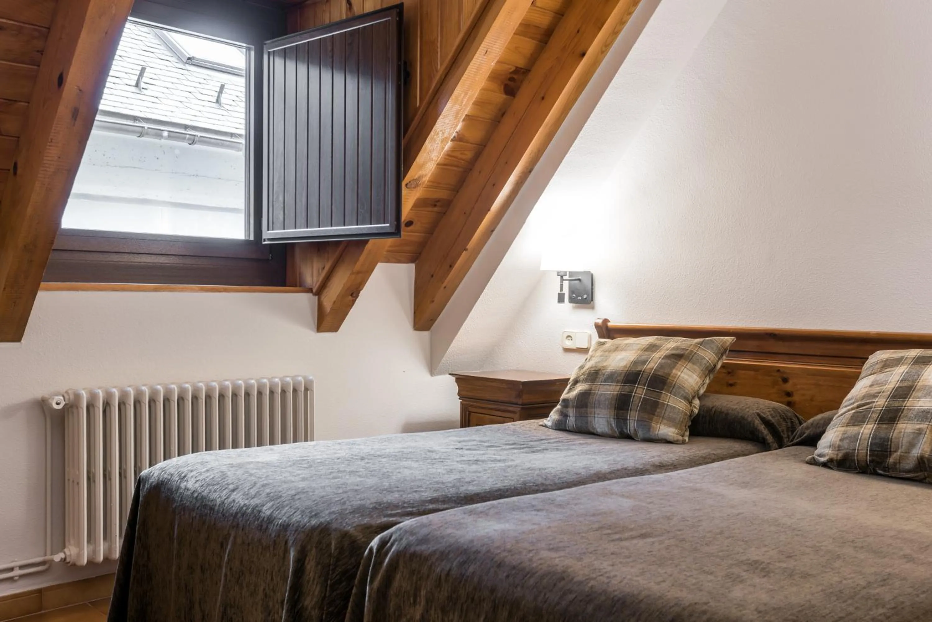 Bed in Riu Nere Mountain Apartments