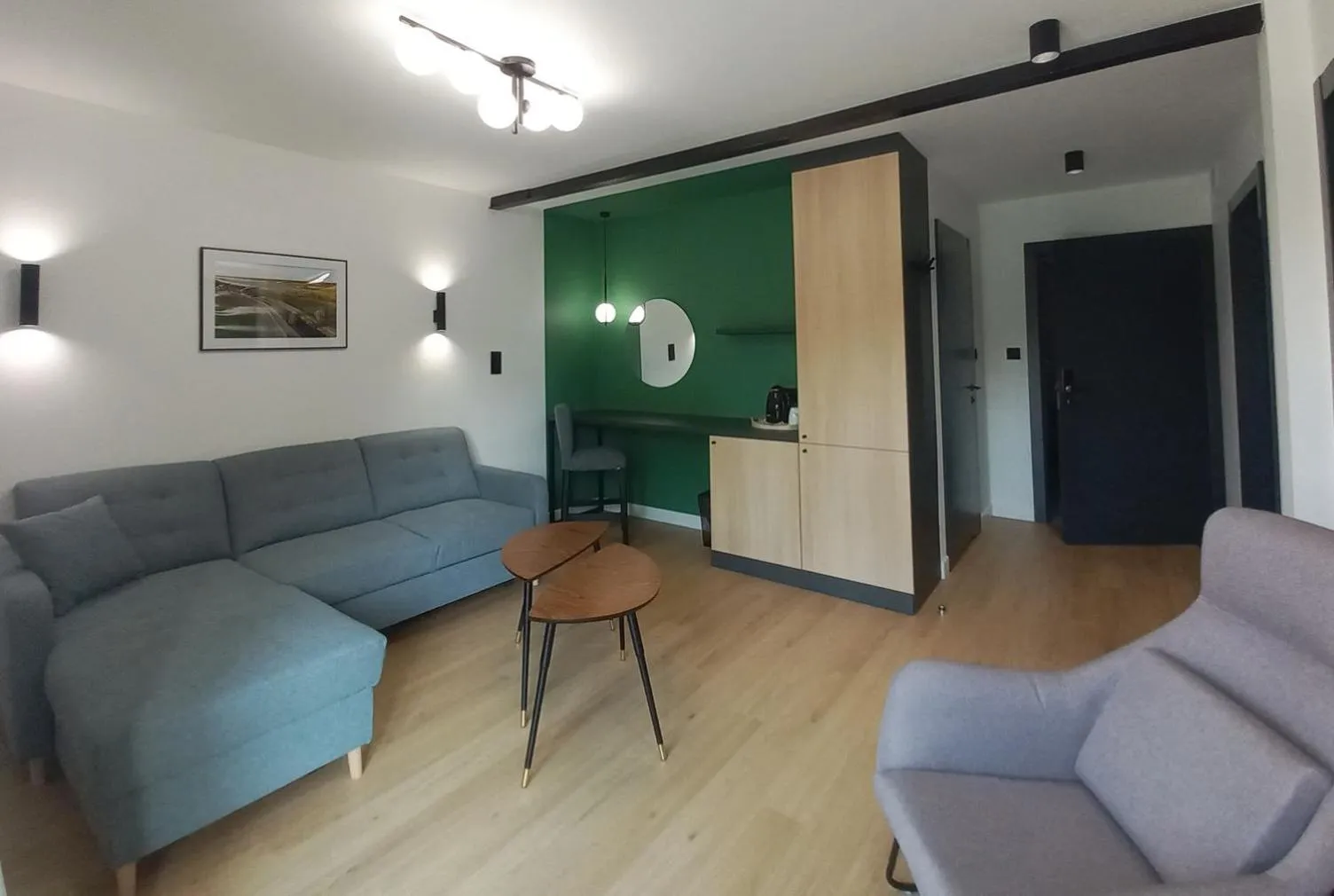 Communal lounge/ TV room in Apartamenty Między Mostami