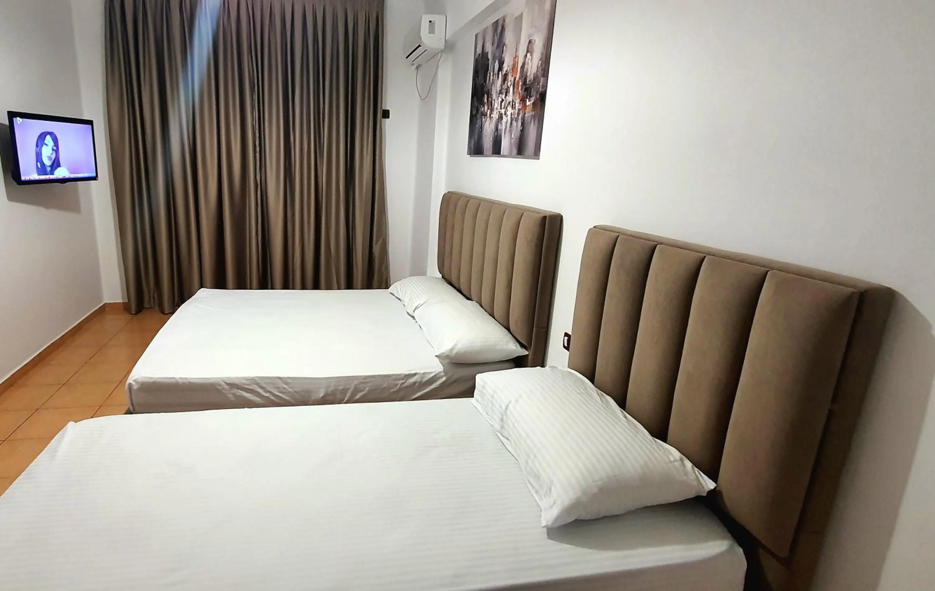 Bed in Hotel de Ksamil