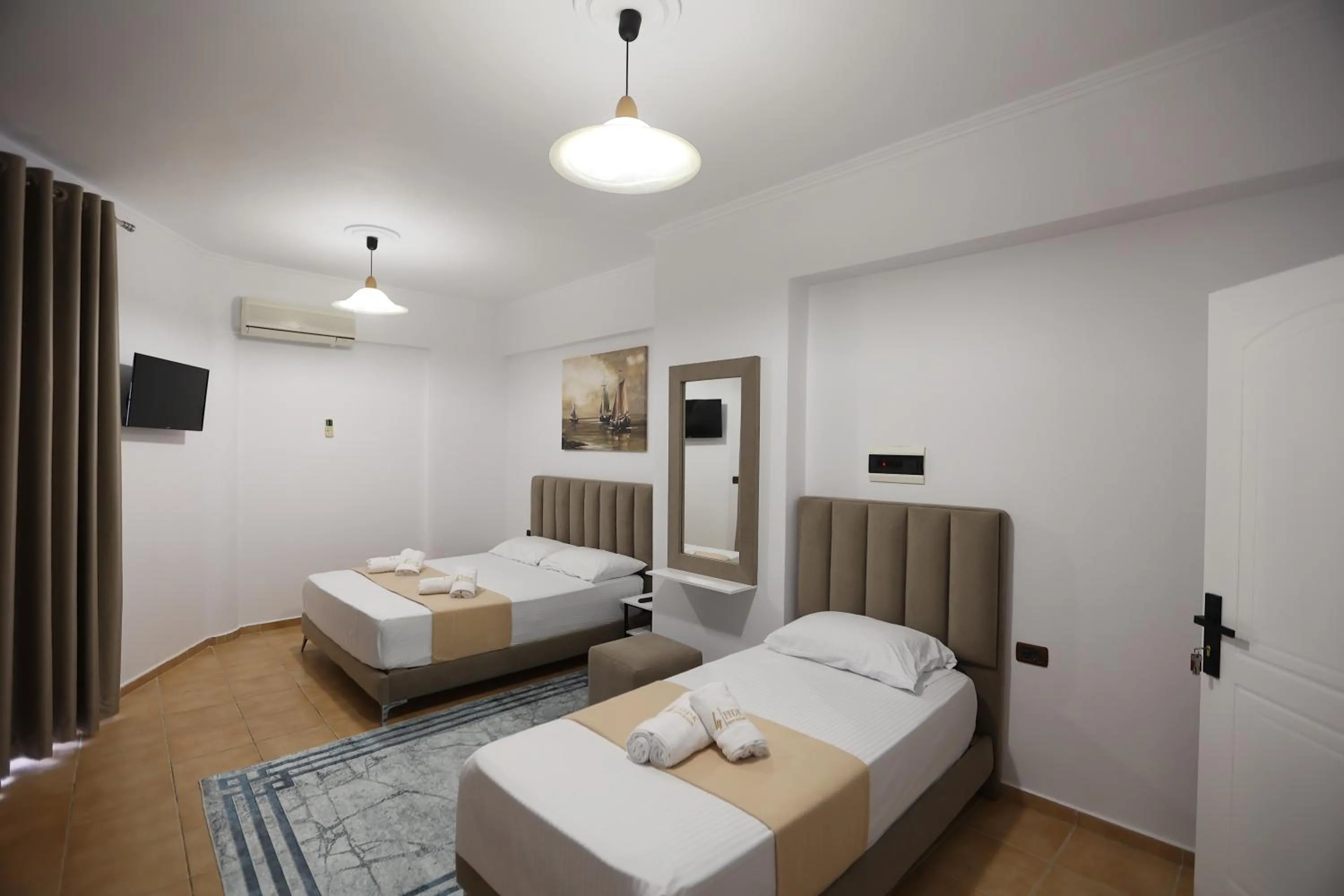 Bed in Hotel de Ksamil