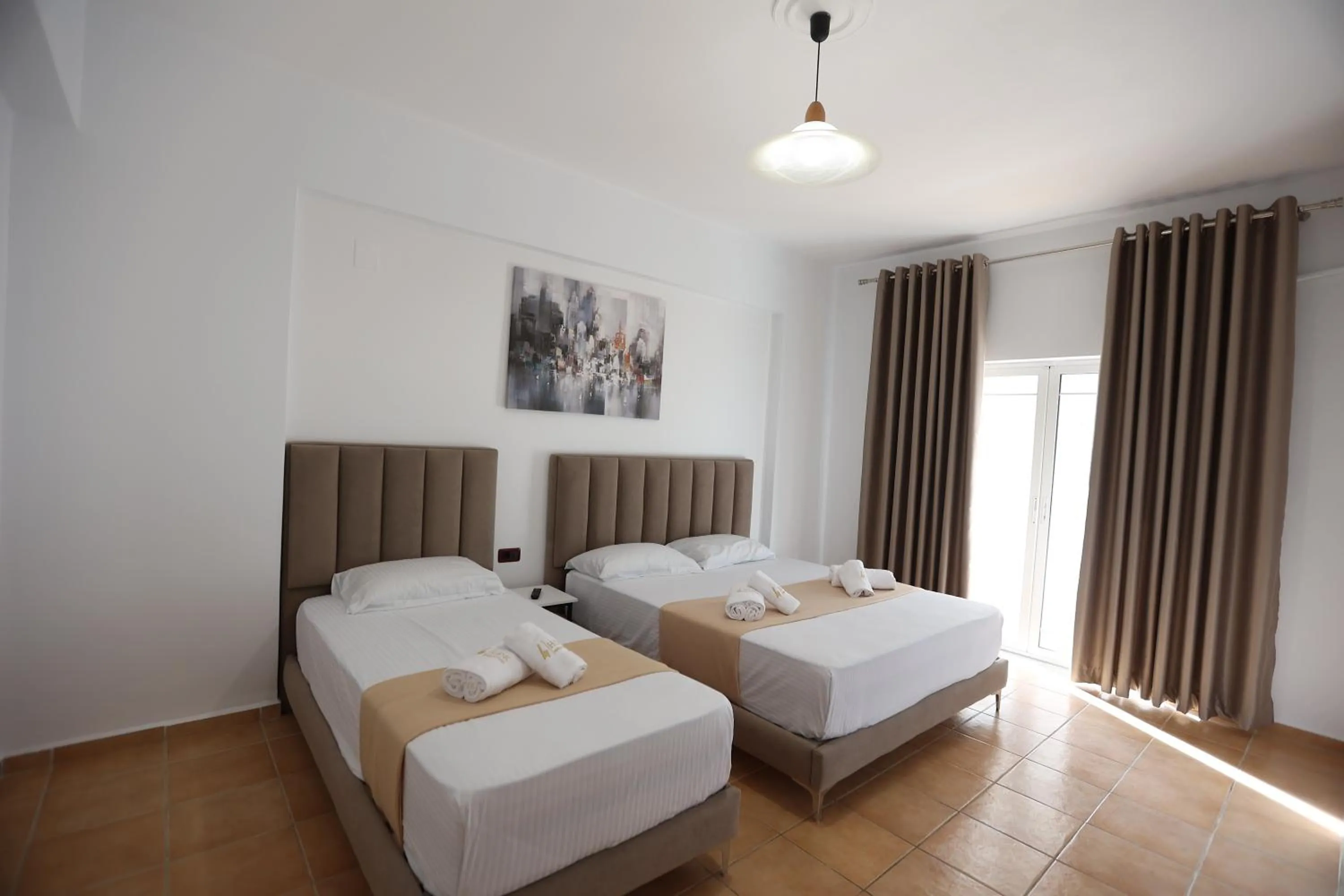 Bed in Hotel de Ksamil