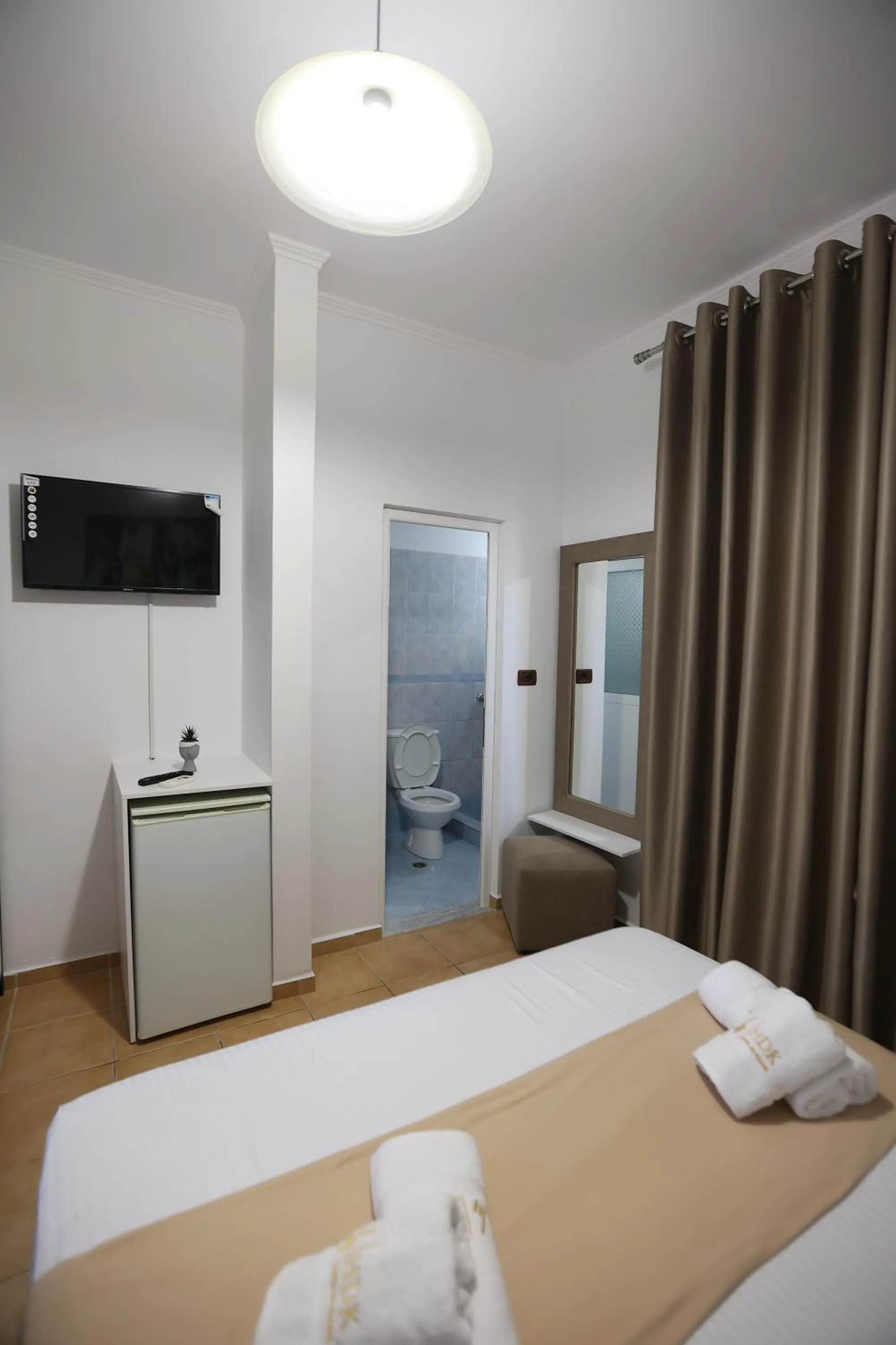 Bed in Hotel de Ksamil