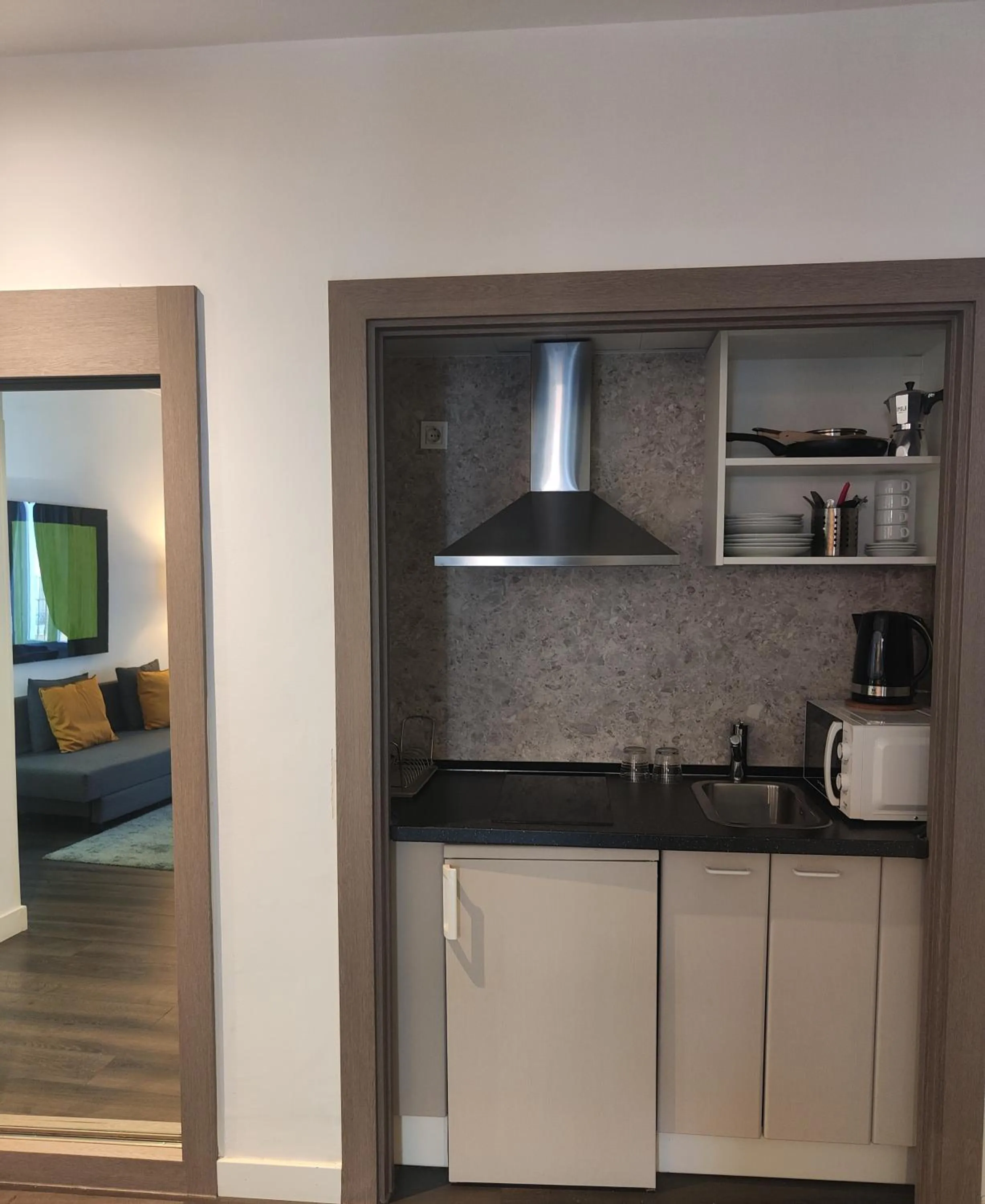 Kitchen or kitchenette in Suite Prado